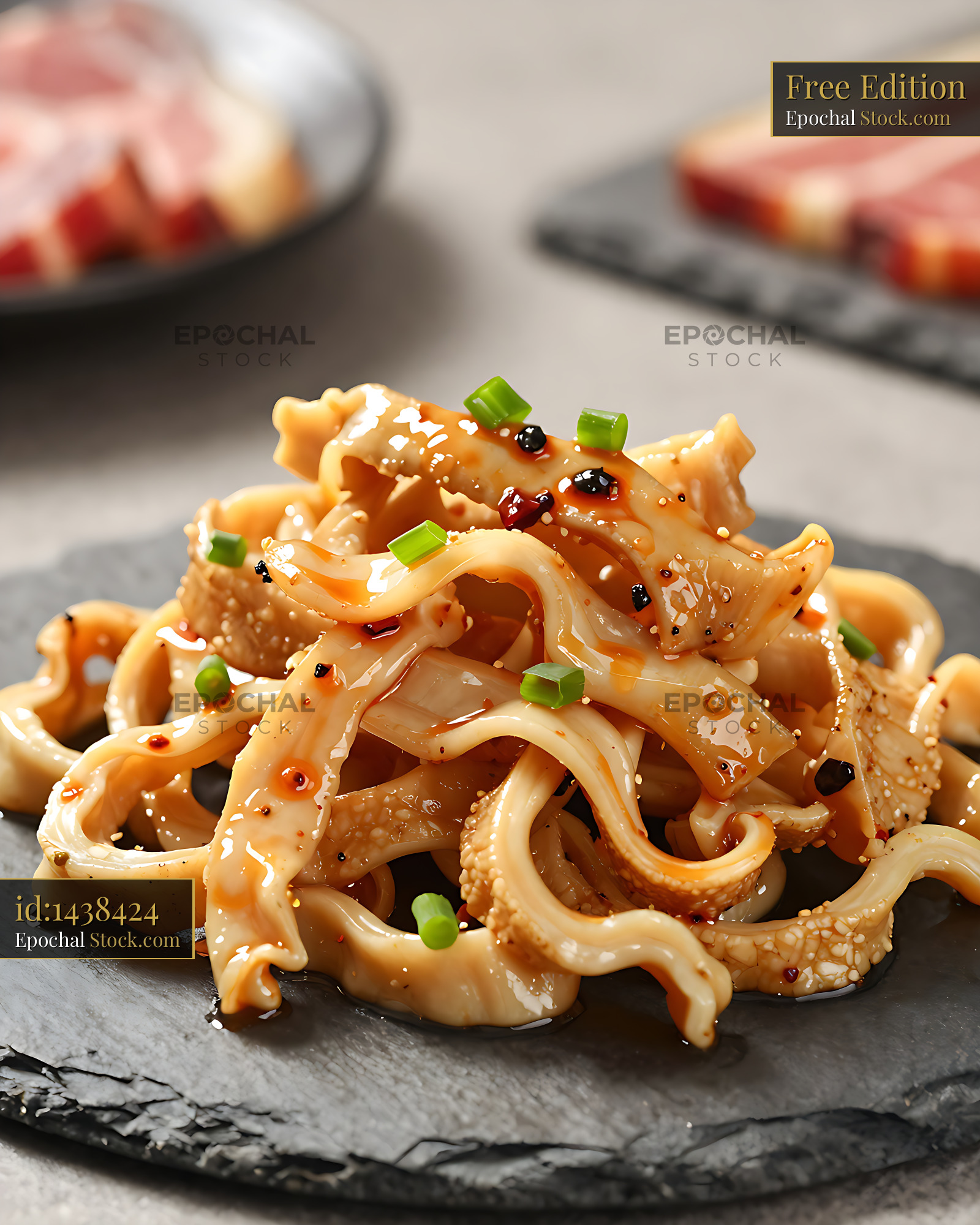 Okinawa Mimiga salad with thinly sliced pig ears and green onions - stock photo