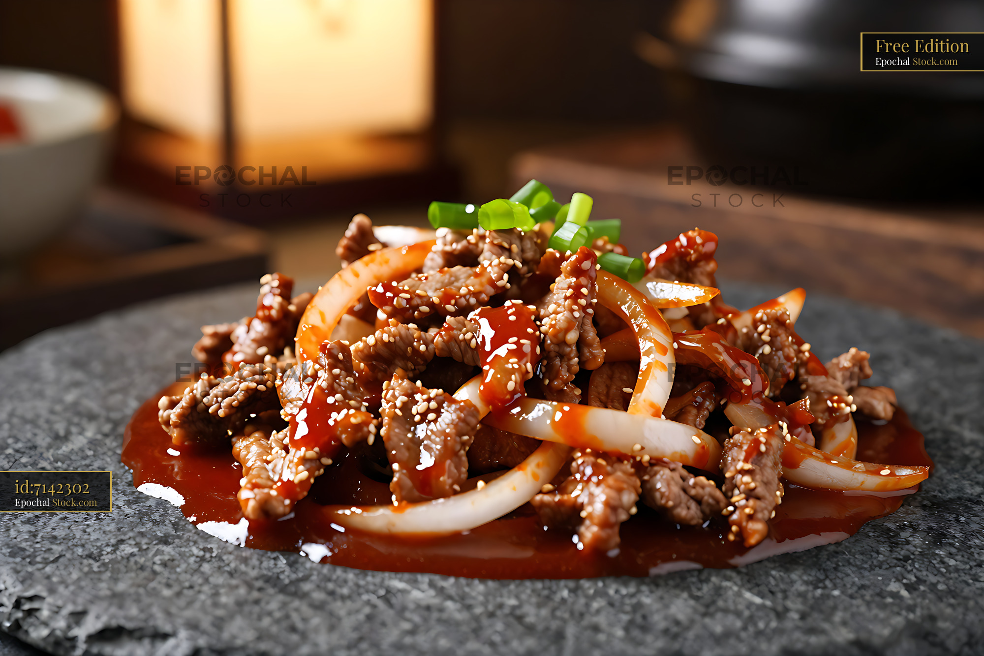 Spicy Jeolla Dwaeji Bulgogi marinated pork with onions and sesame - stock photo