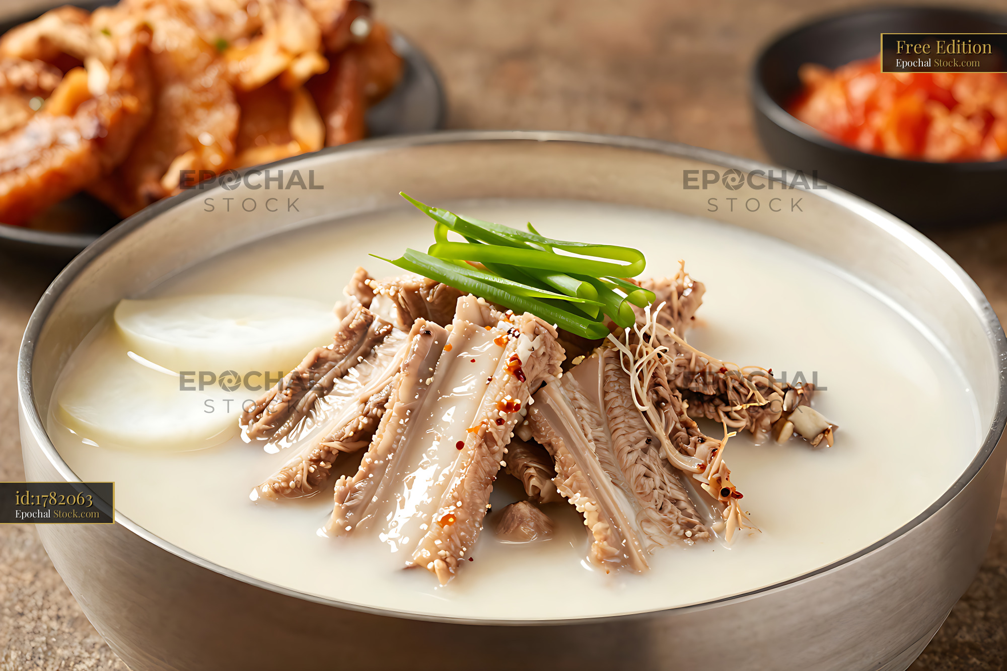Korean beef short rib soup with milky broth and fresh green onions - stock photo
