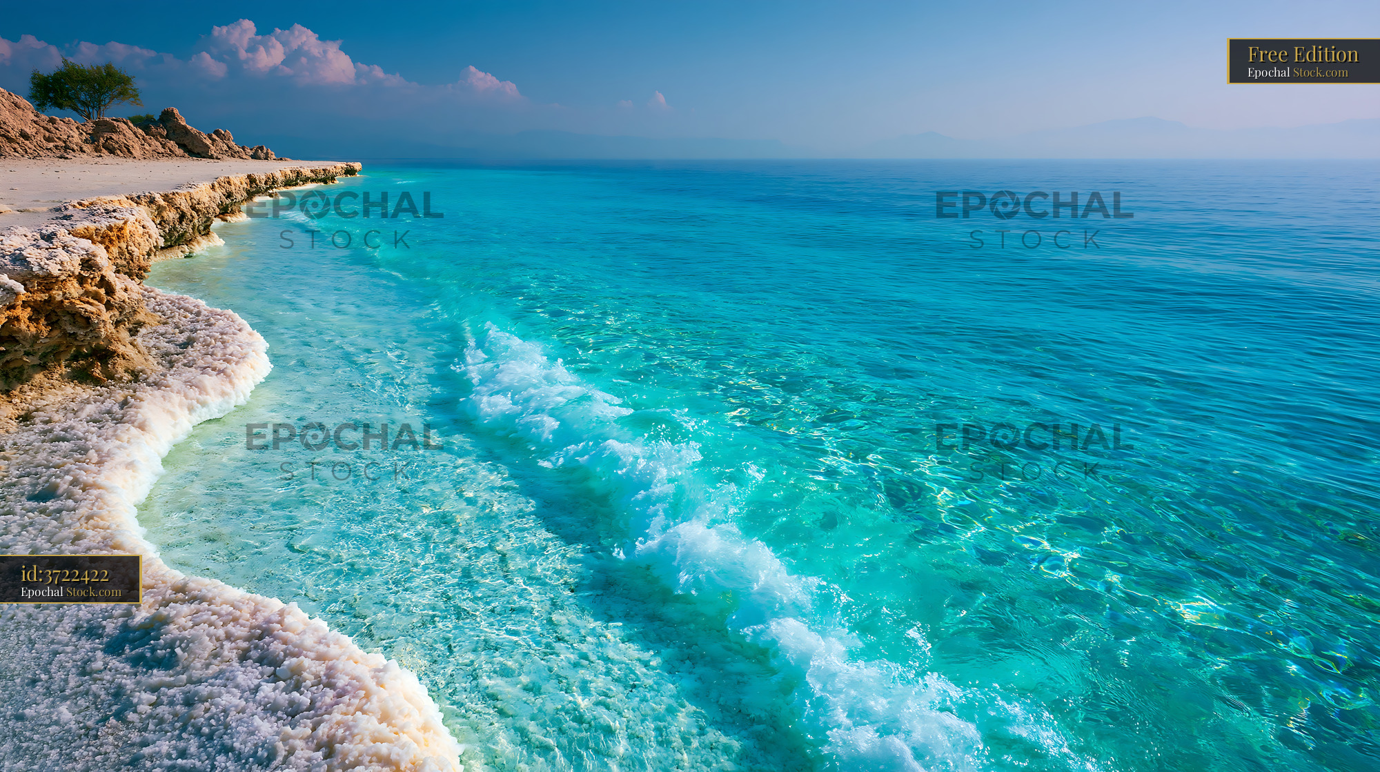 Salar coastline with turquoise water and white salt formations - stock photo