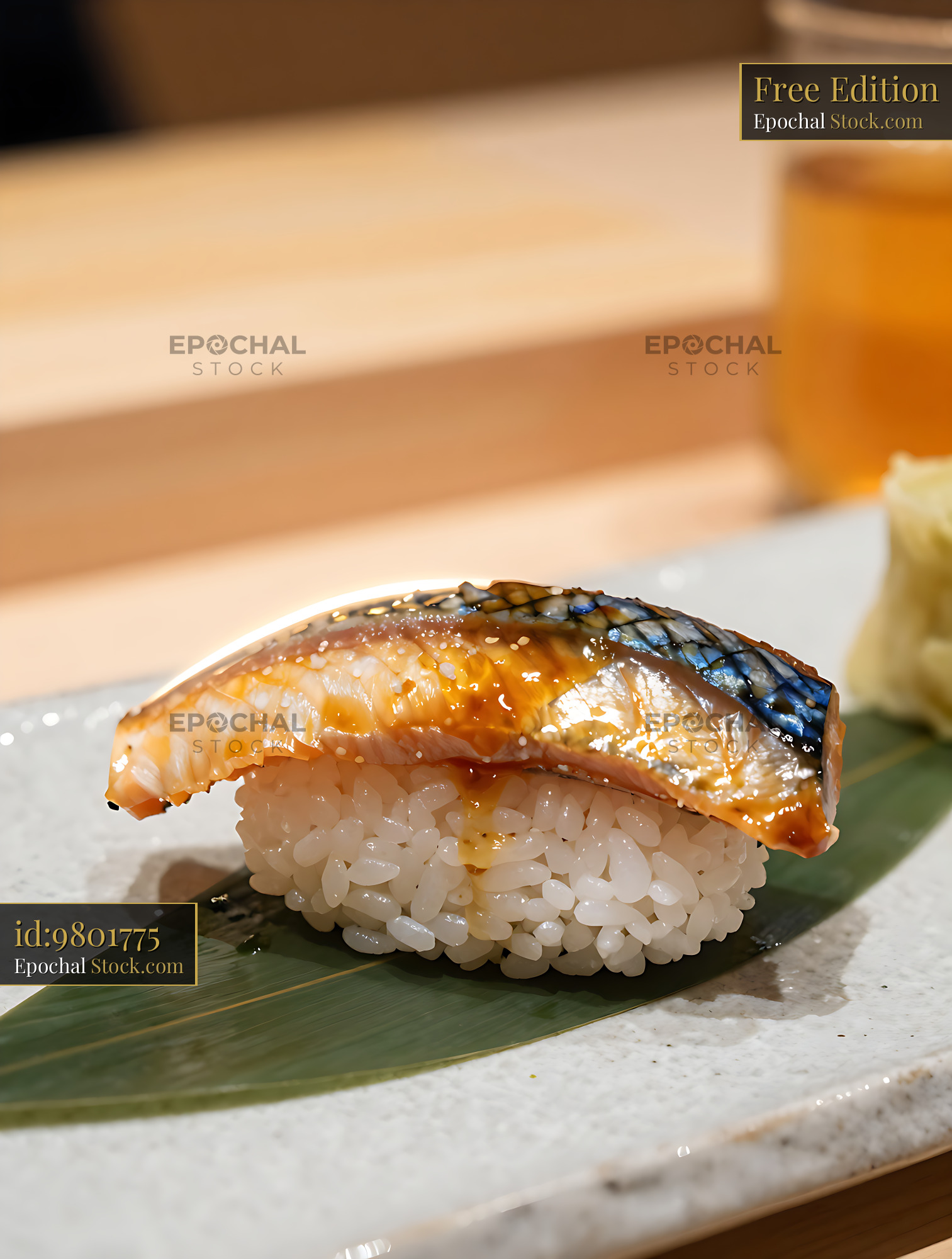 Kakinoha sushi with glazed mackerel on a green leaf - stock photo