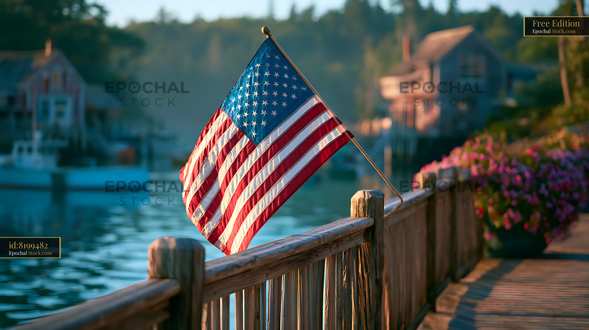 American flag on a wooden pier in a peaceful Maine harbor at sunset - stock photo