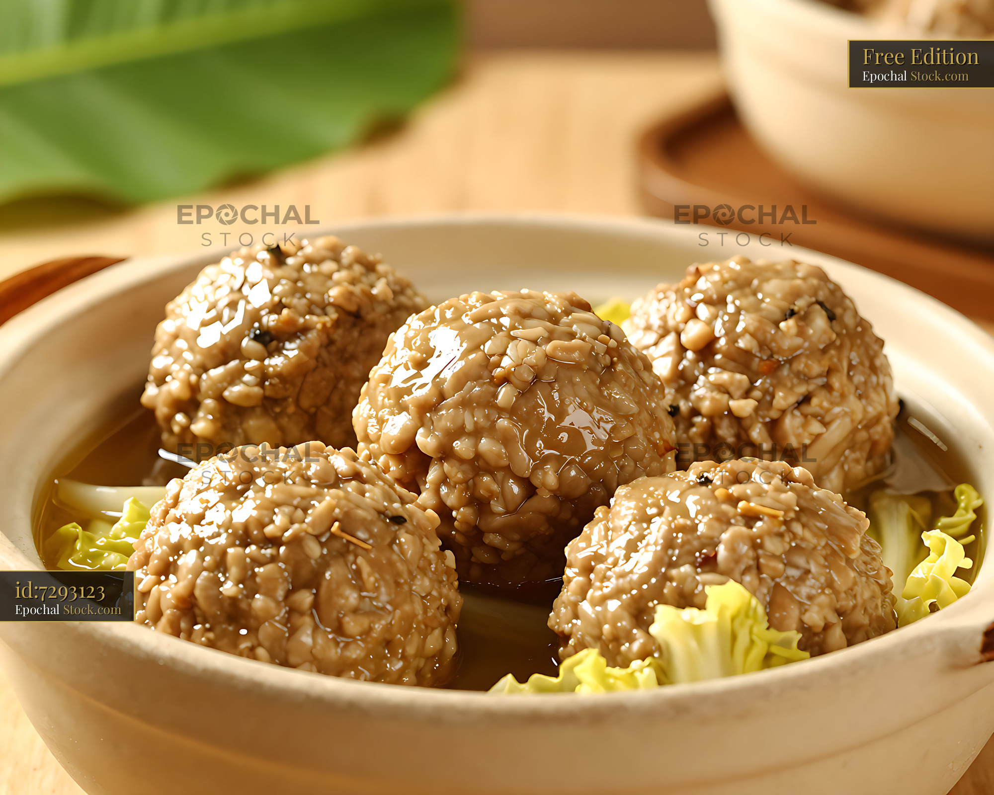 Traditional Jiangsu lion's head meatballs in a ceramic clay pot - stock photo