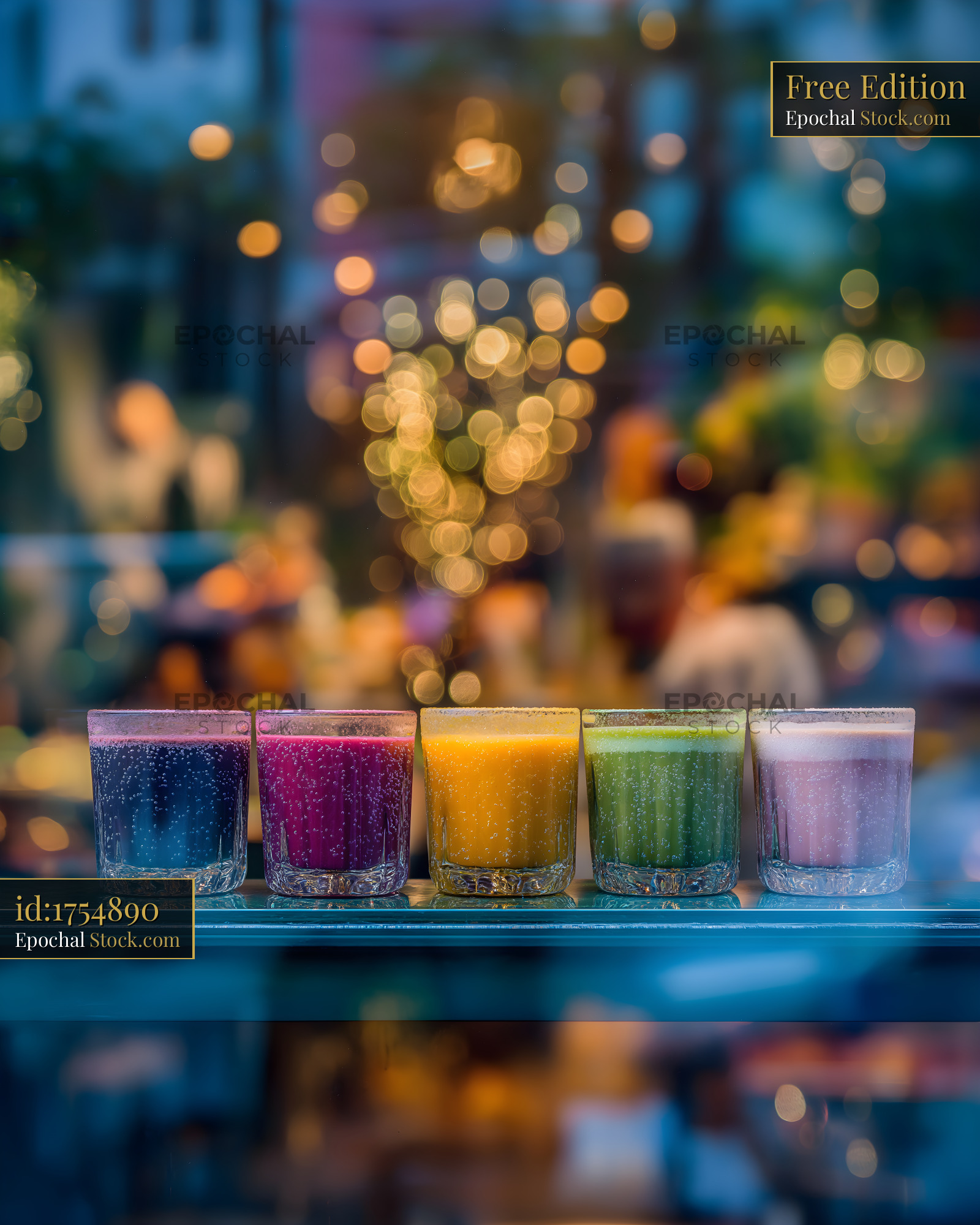 Colorful drinks line a glass shelf in a busy cafe setting Free Premium Stock Photo