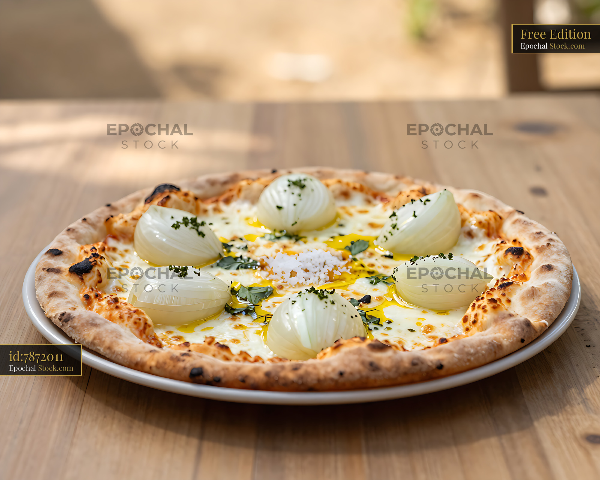 Gourmet pizza pugliese with white onions on a wooden table - stock photo