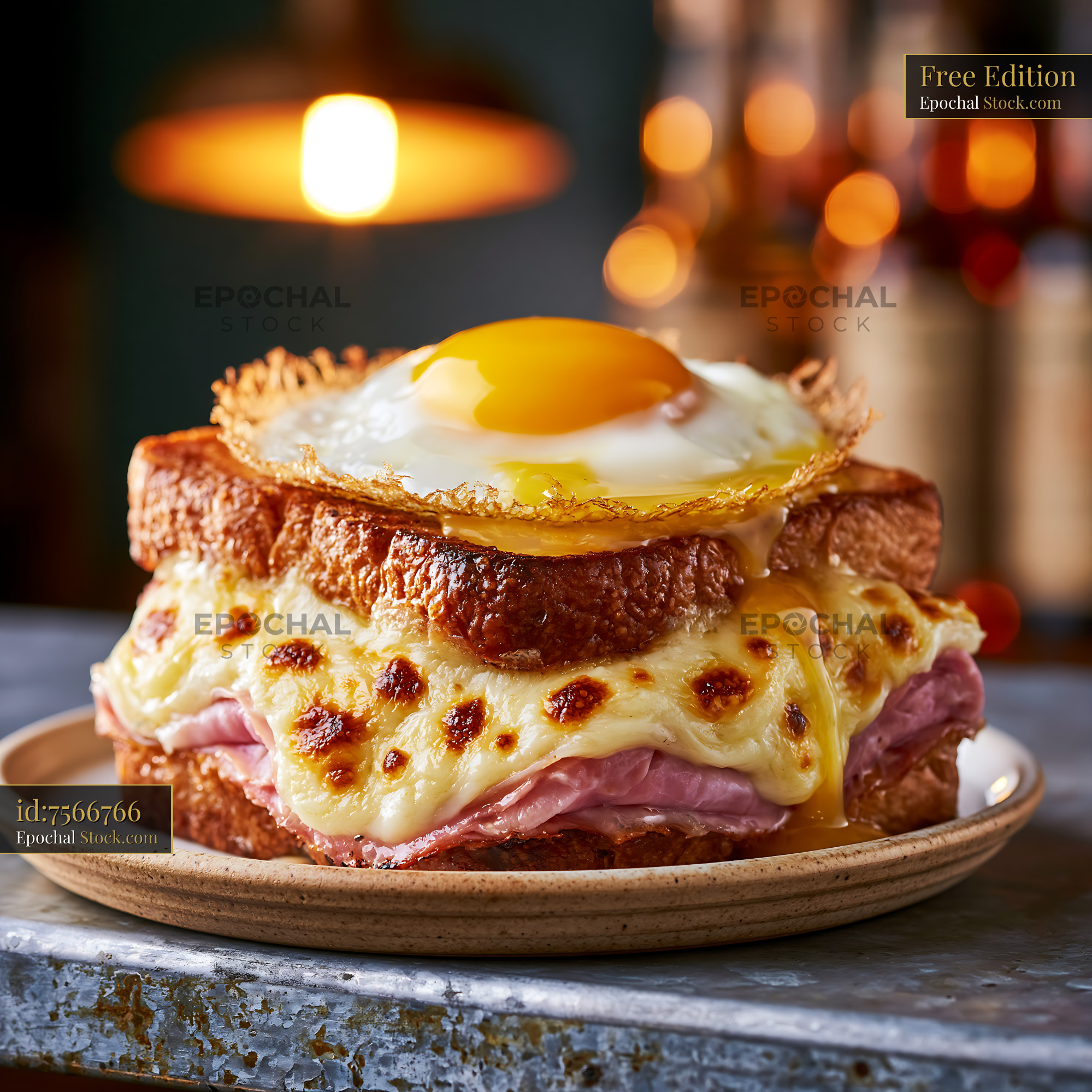 Croque madame egg food with melted cheese and ham on toasted bread - stock photo