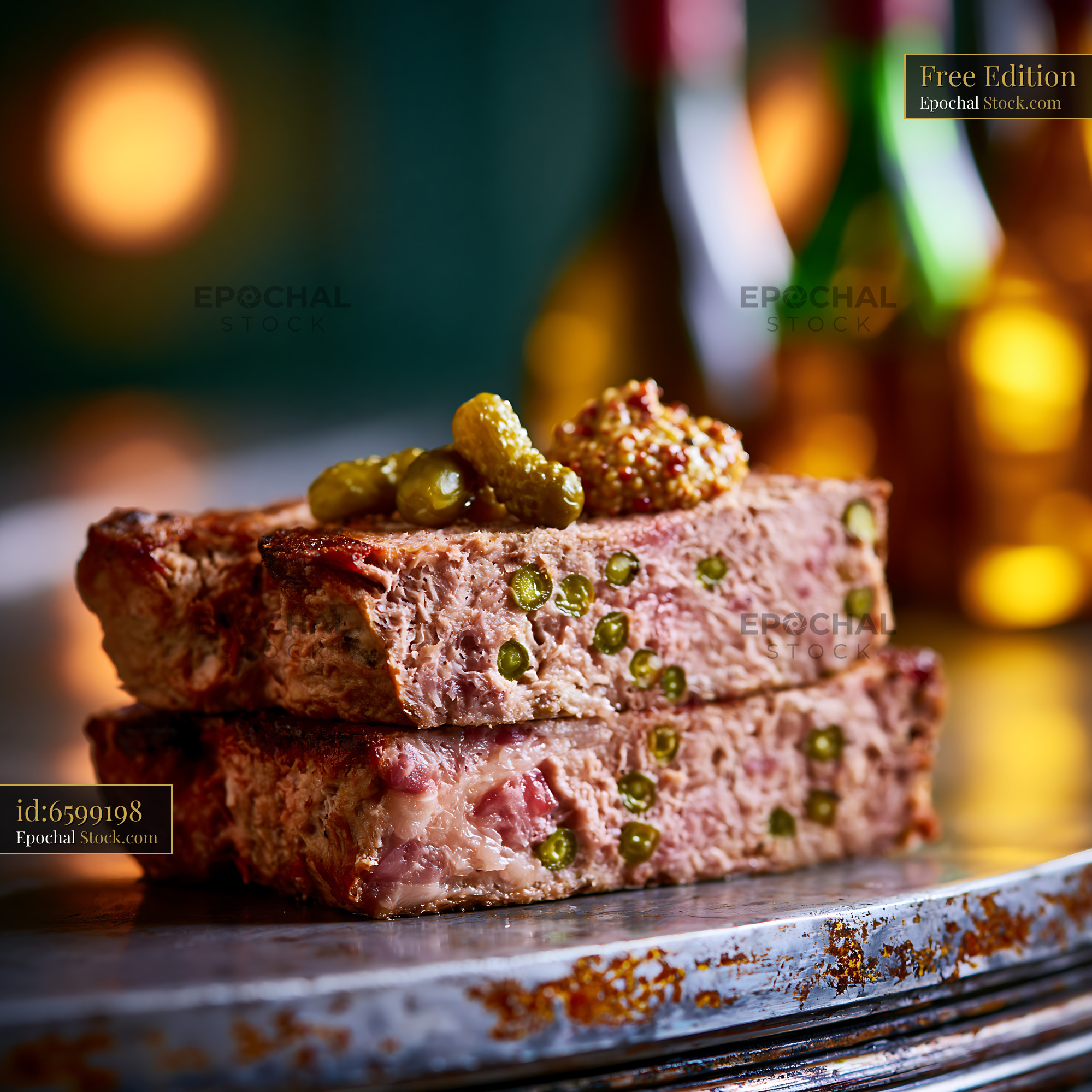 Slices of rustic pate de campagne meat with gherkins and mustard - stock photo