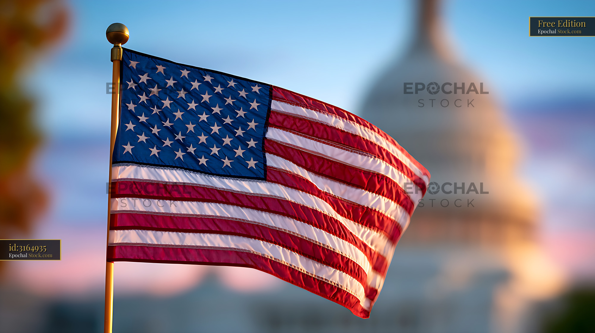 American flag waving in front of the blurred US Capitol building - stock photo