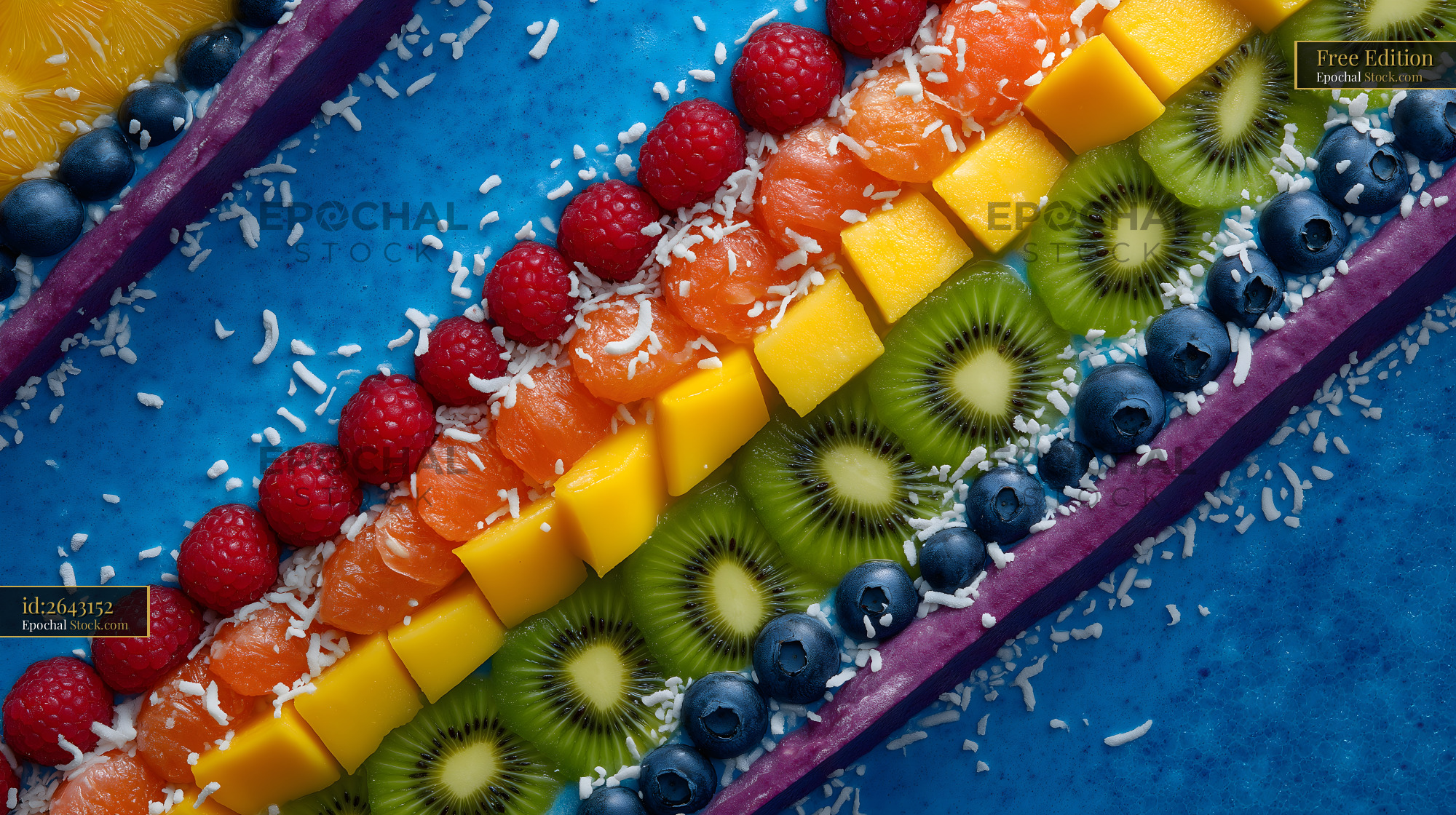 Colorful fruit arrangement on blue background at summer event Free Premium Stock Image