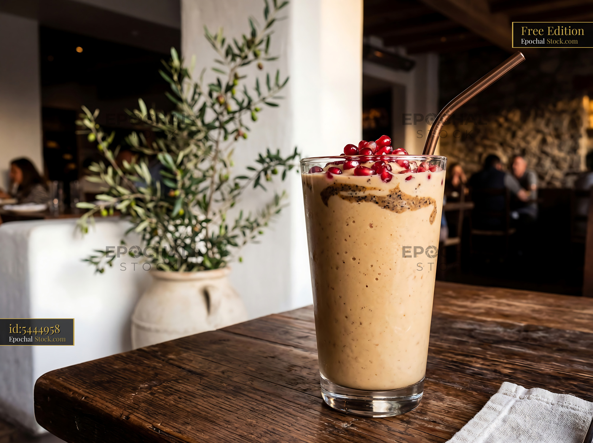 Tahini Date Shake with Pomegranate Seeds - stock photo