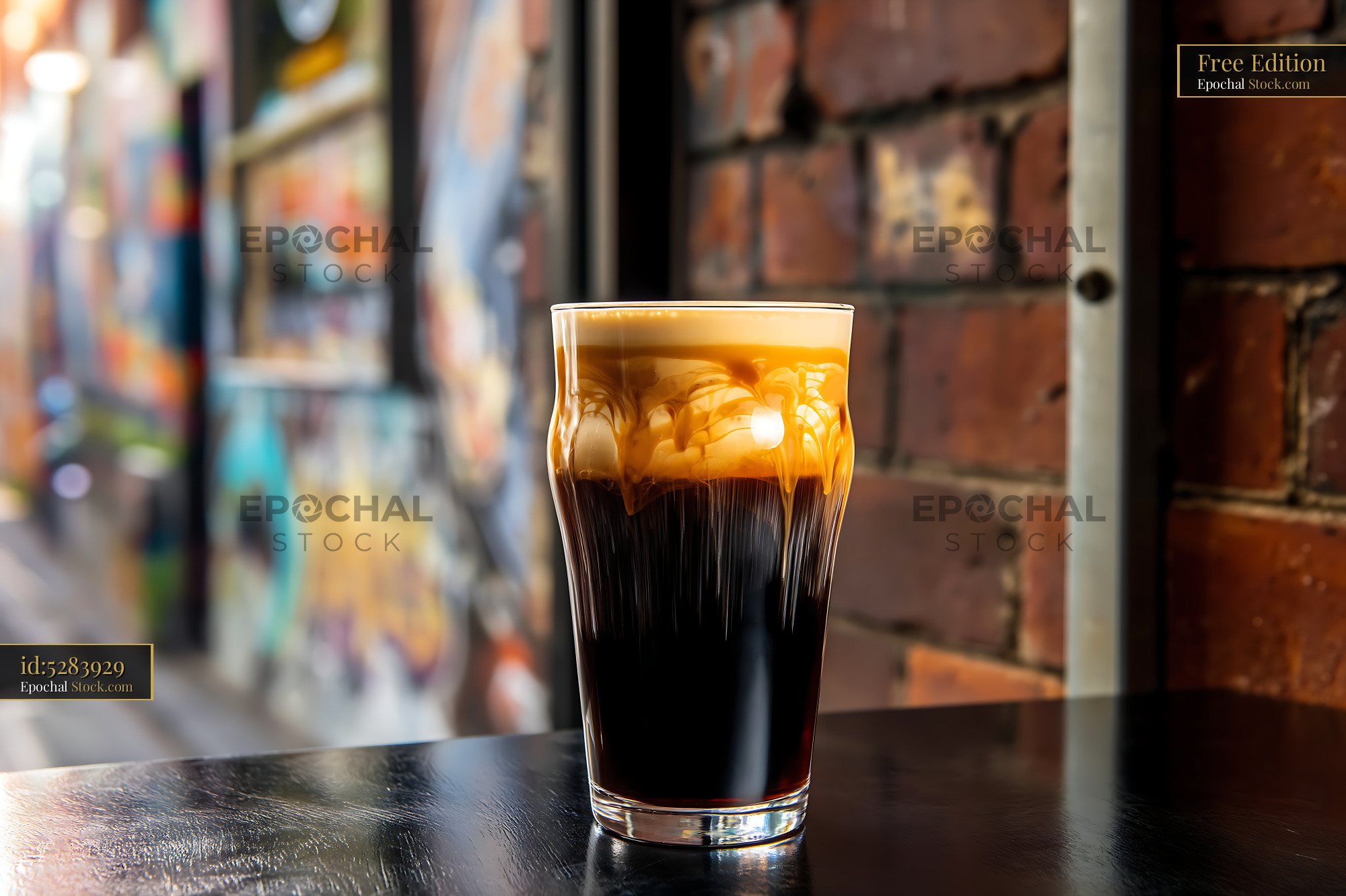 Nitro Caramel Coffee Over Ice at Cafe - stock photo