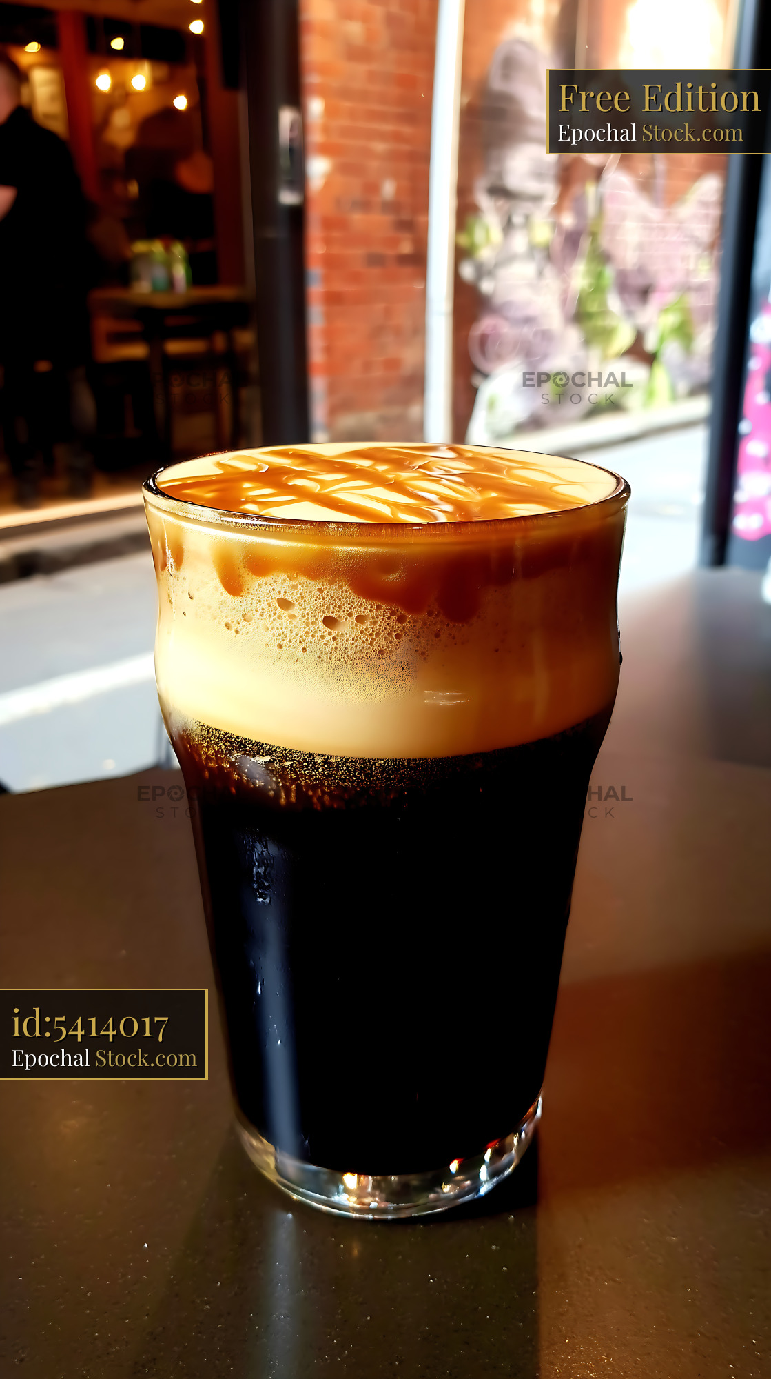 Nitro Caramel Coffee Iced Drink with Foam - stock photo