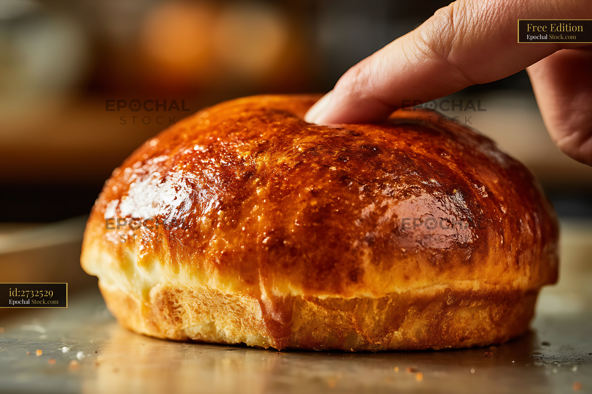 Freshly Baked Golden Brioche with Hand Touch - stock photo