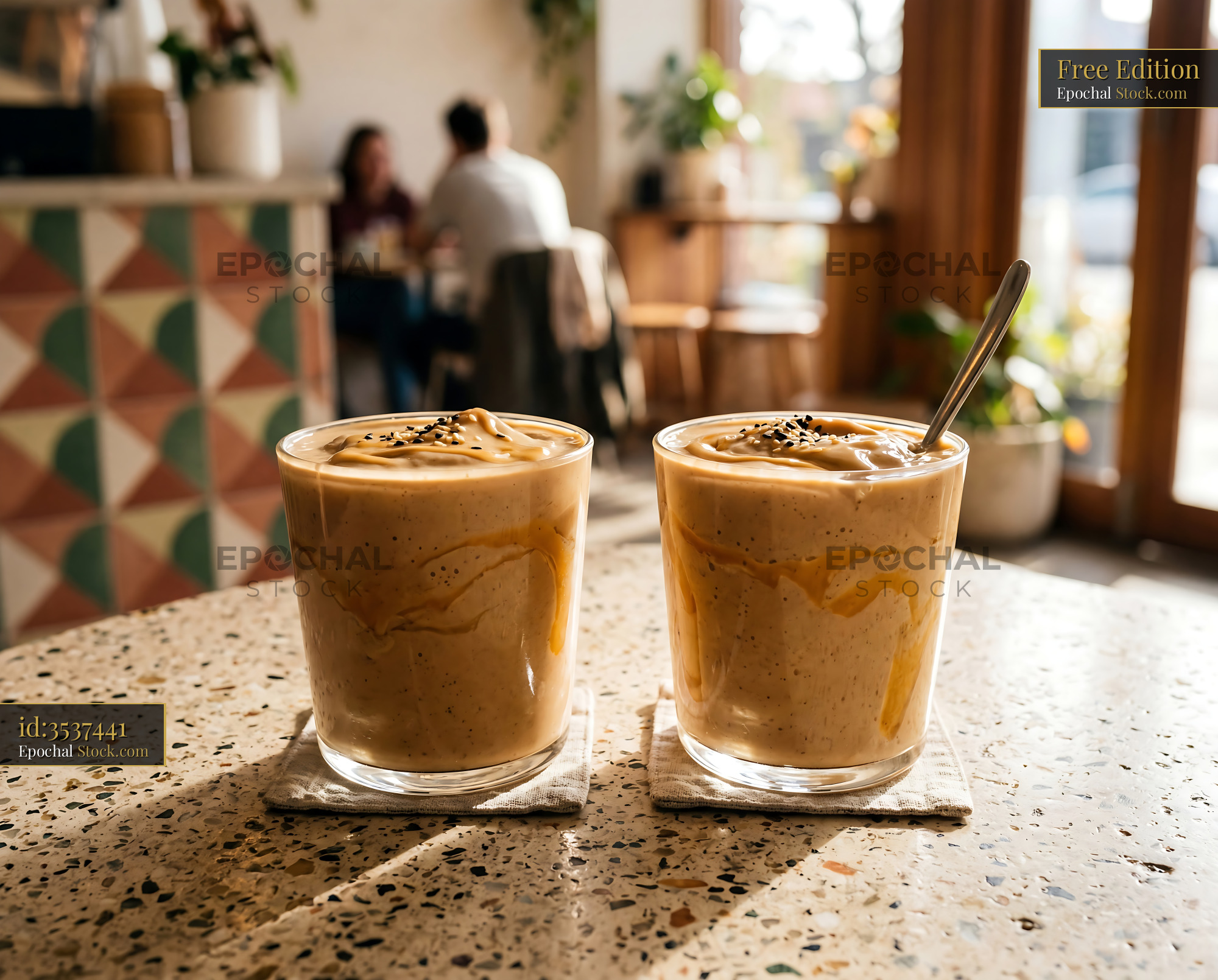 Tahini Date Shake in Cozy Cafe Setting - stock photo