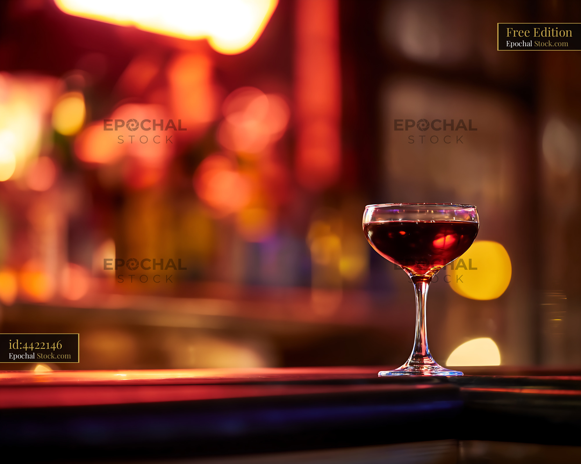 Bushwick Cocktail in Coupe Glass at Bar - stock photo