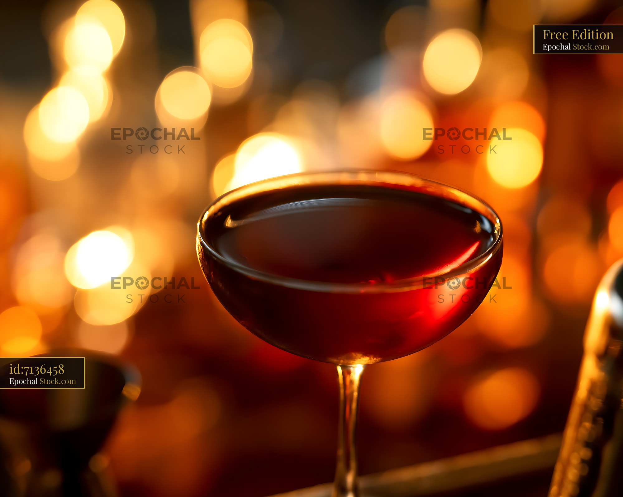 Bushwick Cocktail in Coupe Glass with Bokeh - stock photo