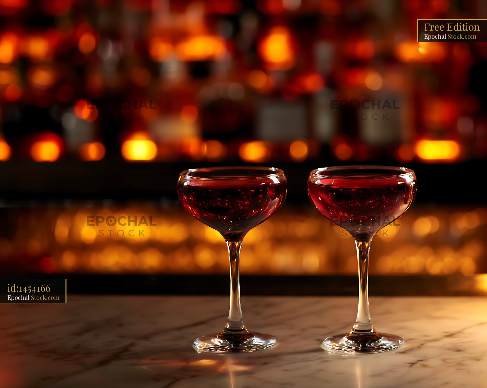 Pair of Bushwick Cocktails Glowing in Bar Light - stock photo