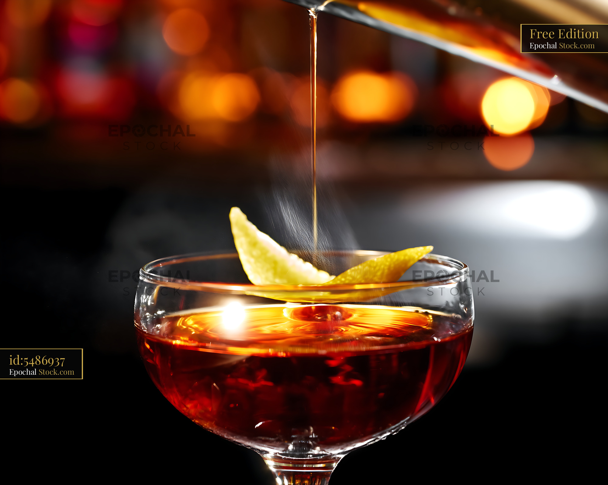 Bushwick Cocktail Pour with Lemon Twist - stock photo