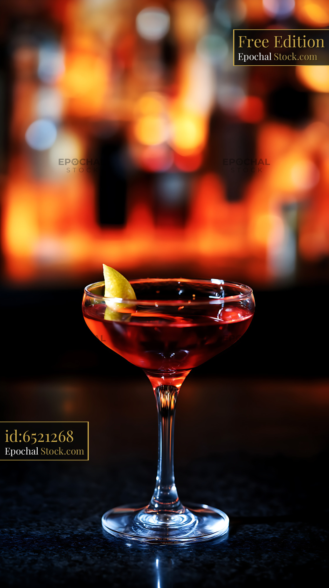 Bushwick Cocktail with Lime Twist Coupe Glass - stock photo