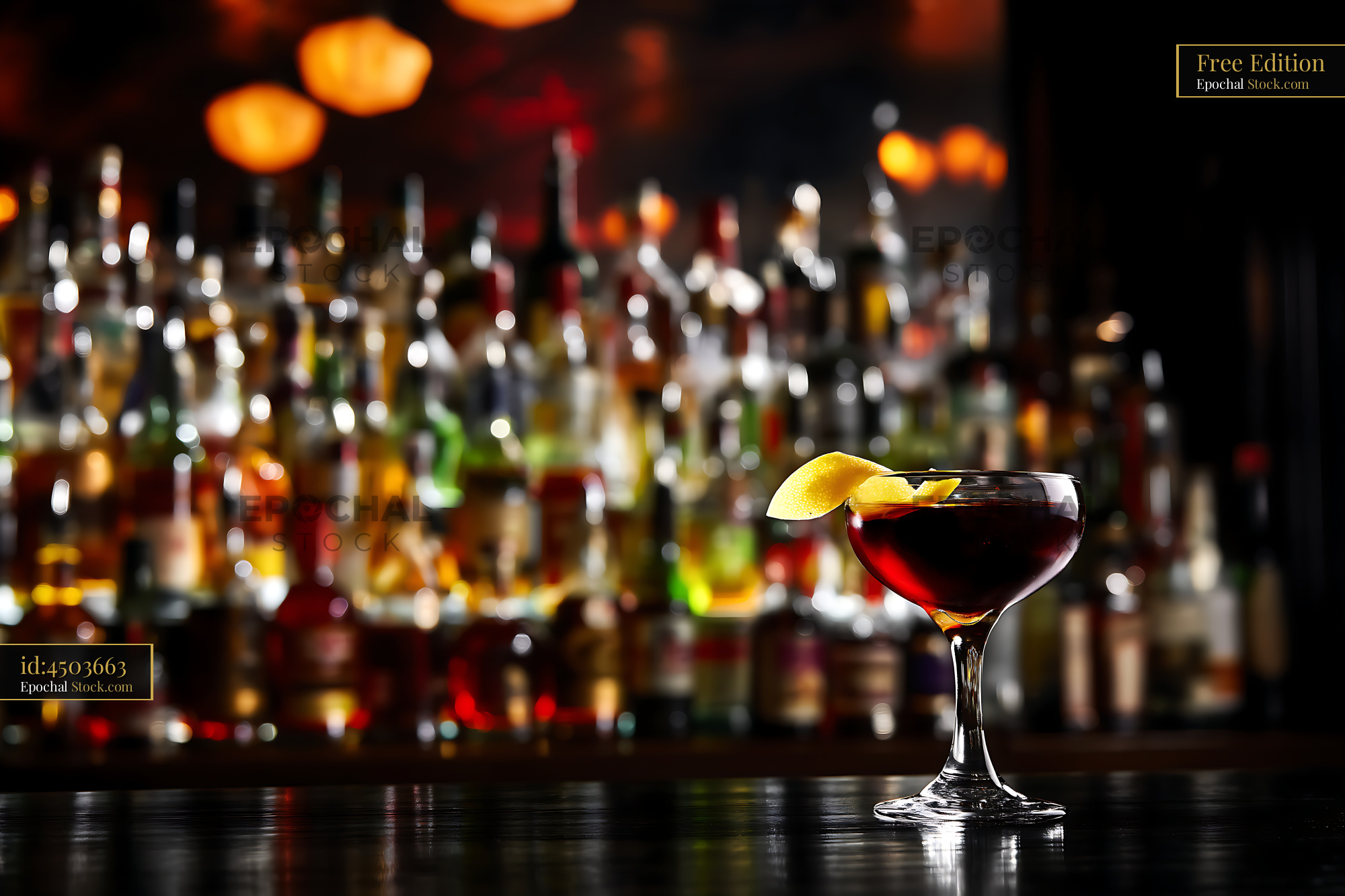 Bushwick Cocktail with Lemon Twist at Bar - stock photo