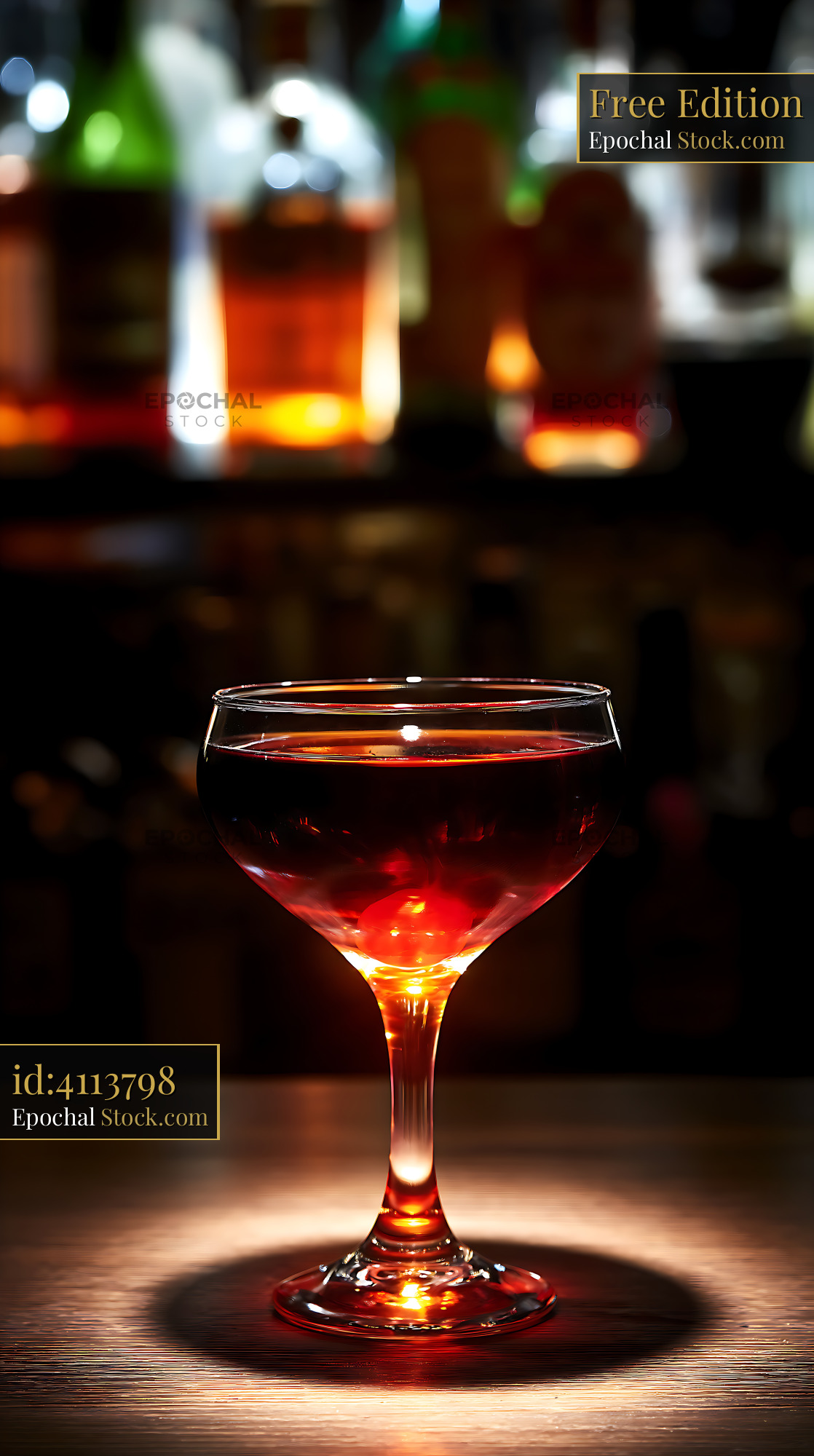 Cocktail Red Drink in Coupe Glass, Moody Bar Light - stock photo