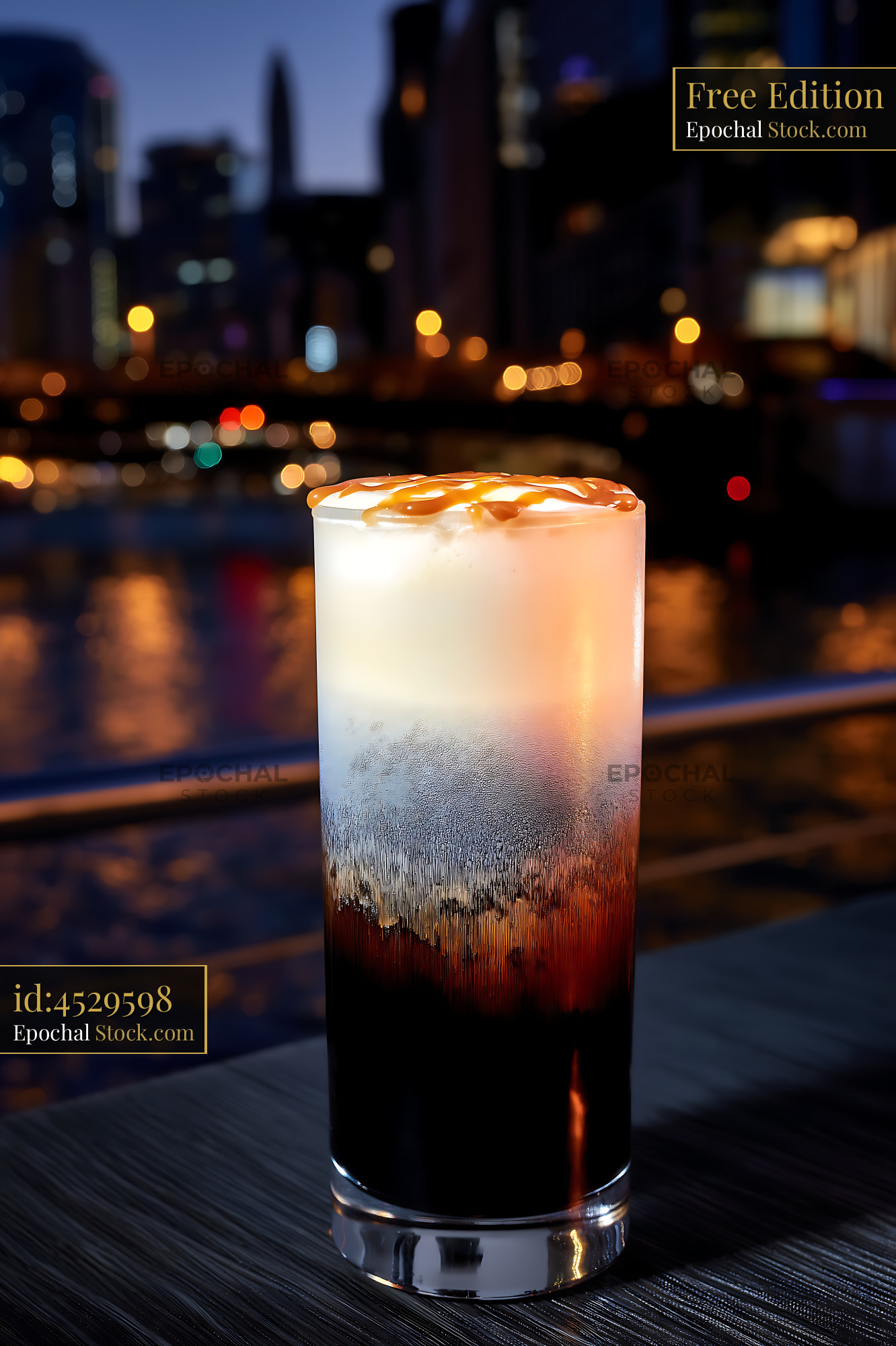 Nitro Caramel Coffee Against Cityscape - stock photo