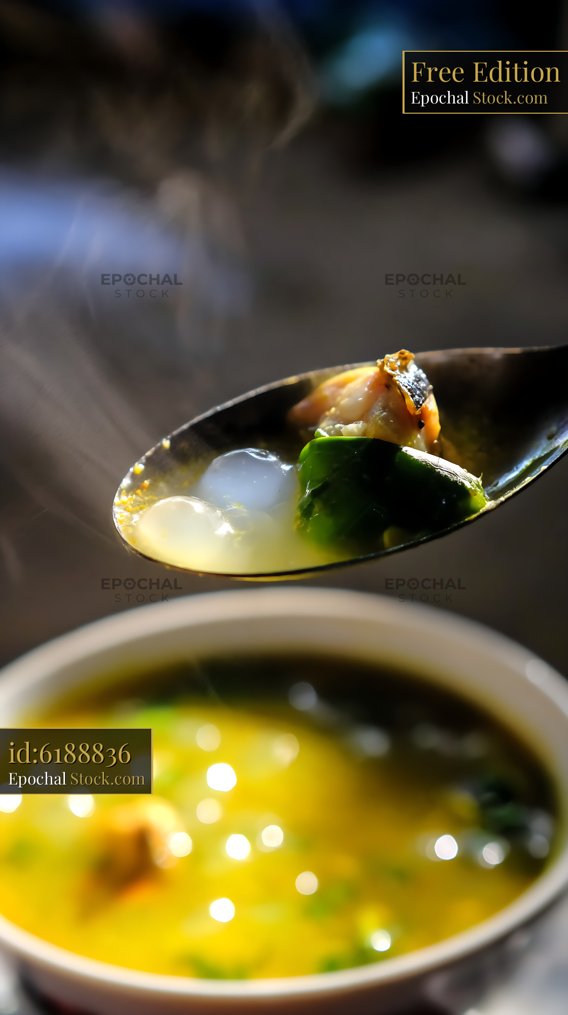 Steaming Hot Lor Mee Soup Served on a Spoon - stock photo