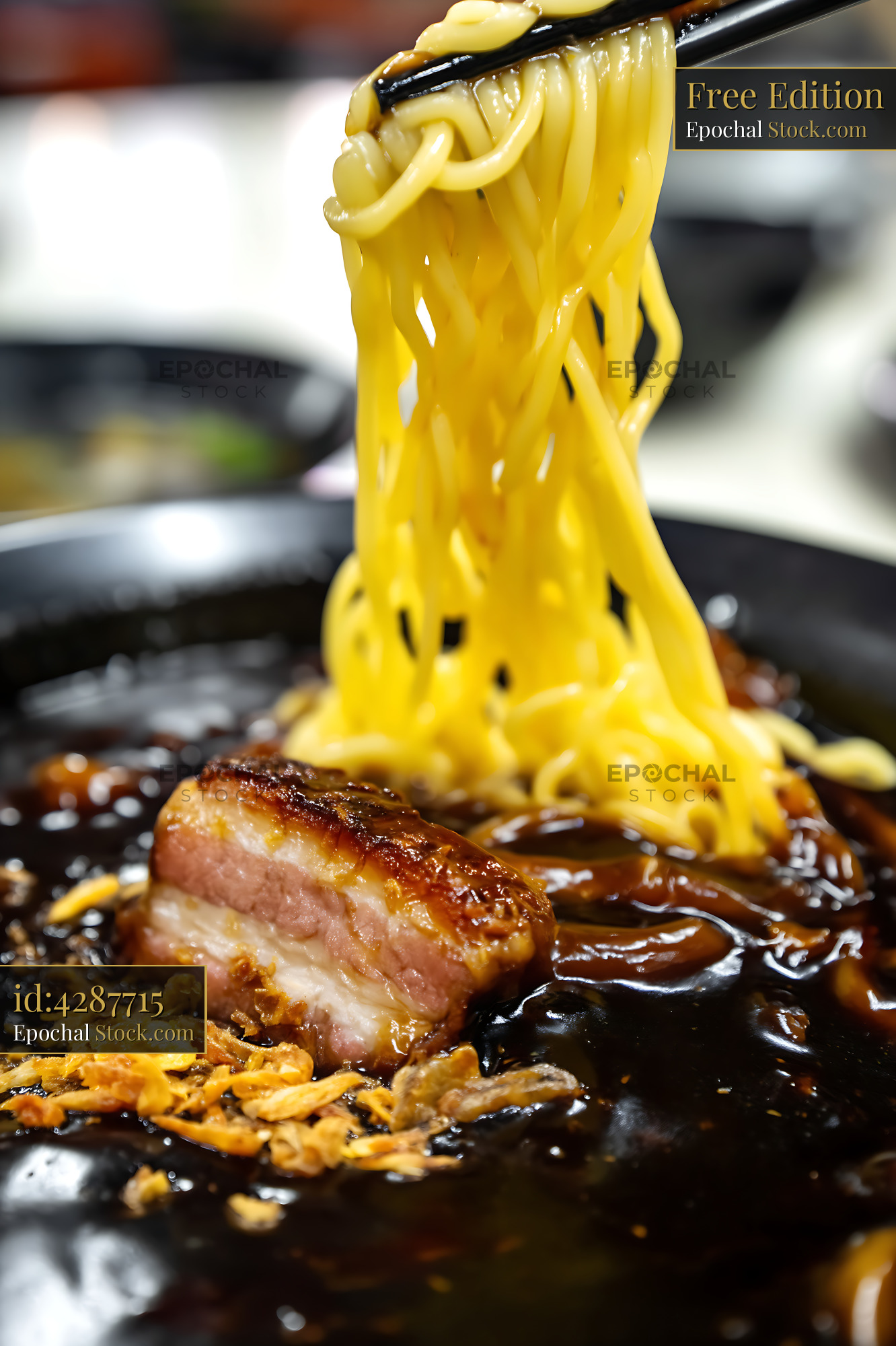 Chopsticks Lifting Lor Mee Soup with Pork Belly - stock photo