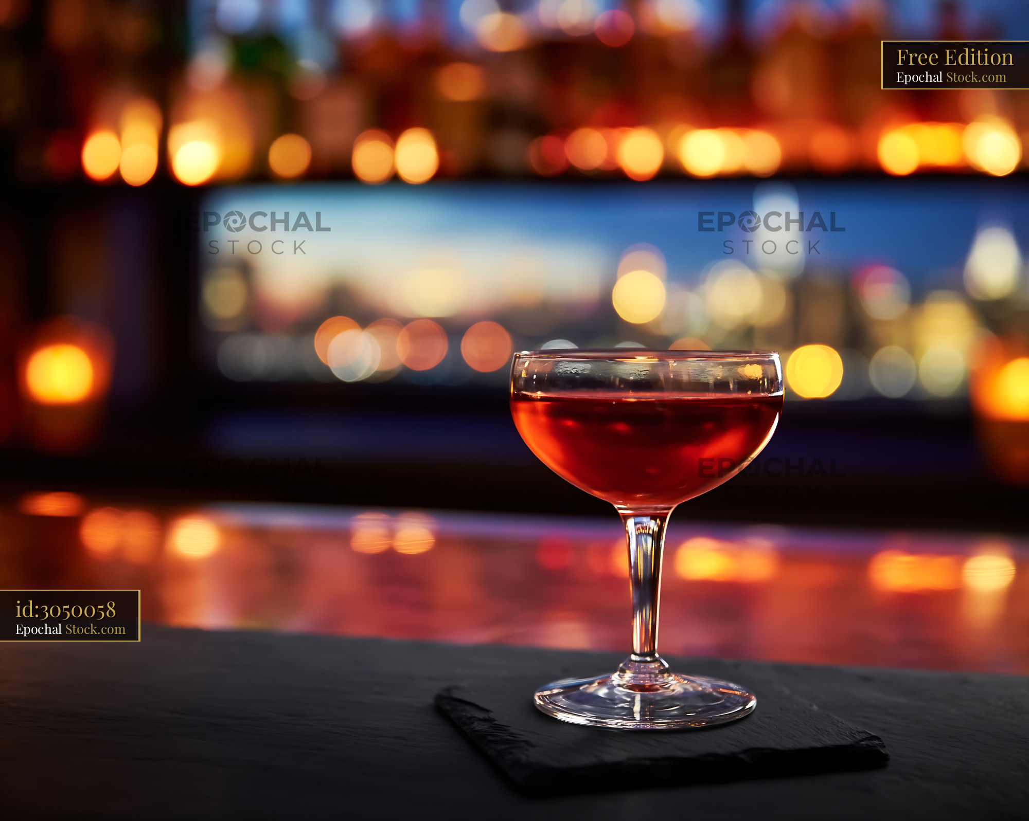 Elegant Red Cocktail on Bar Counter, City Night View - stock photo