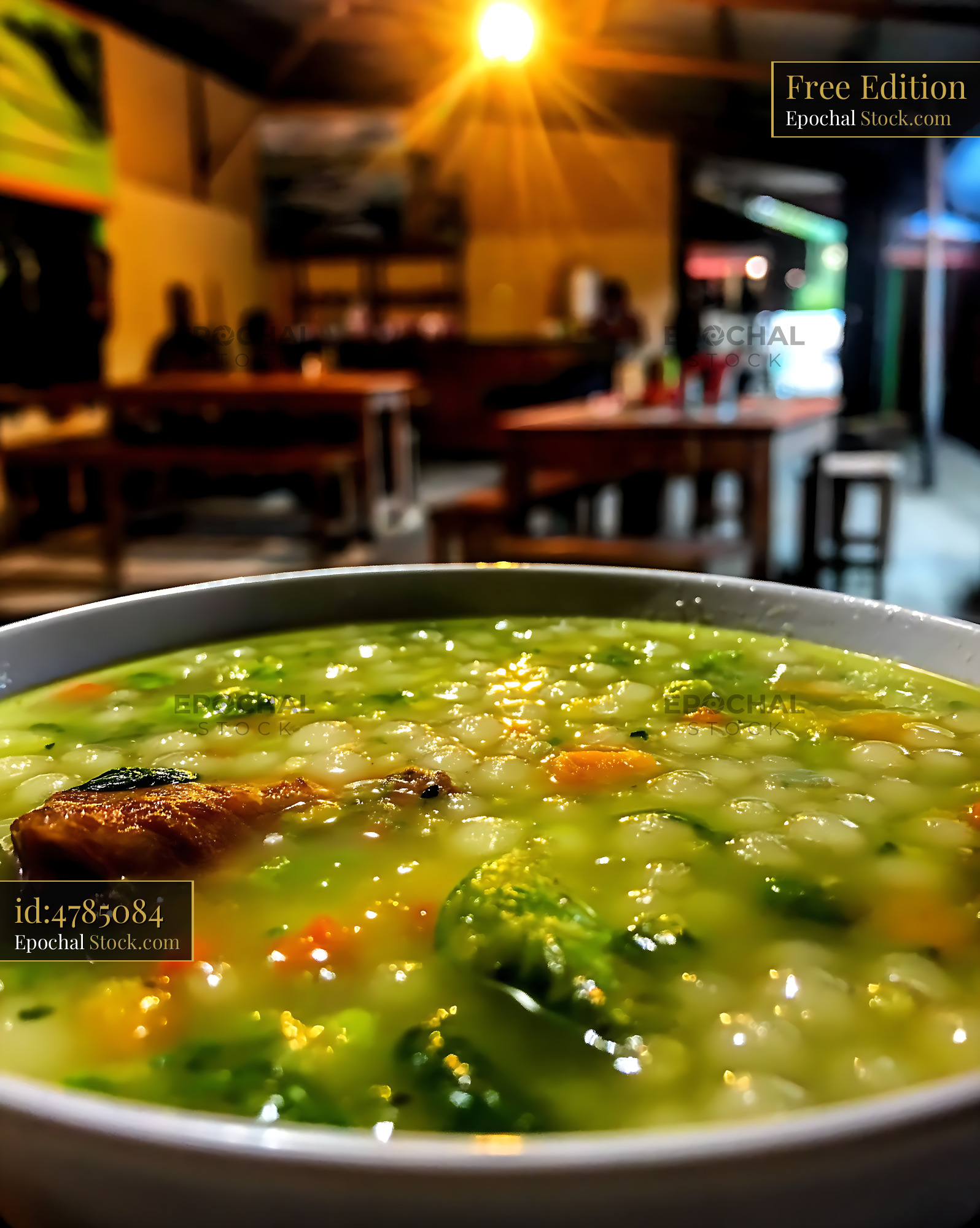 Kapurung Soup in Cozy Restaurant with Warm Lighting - stock photo