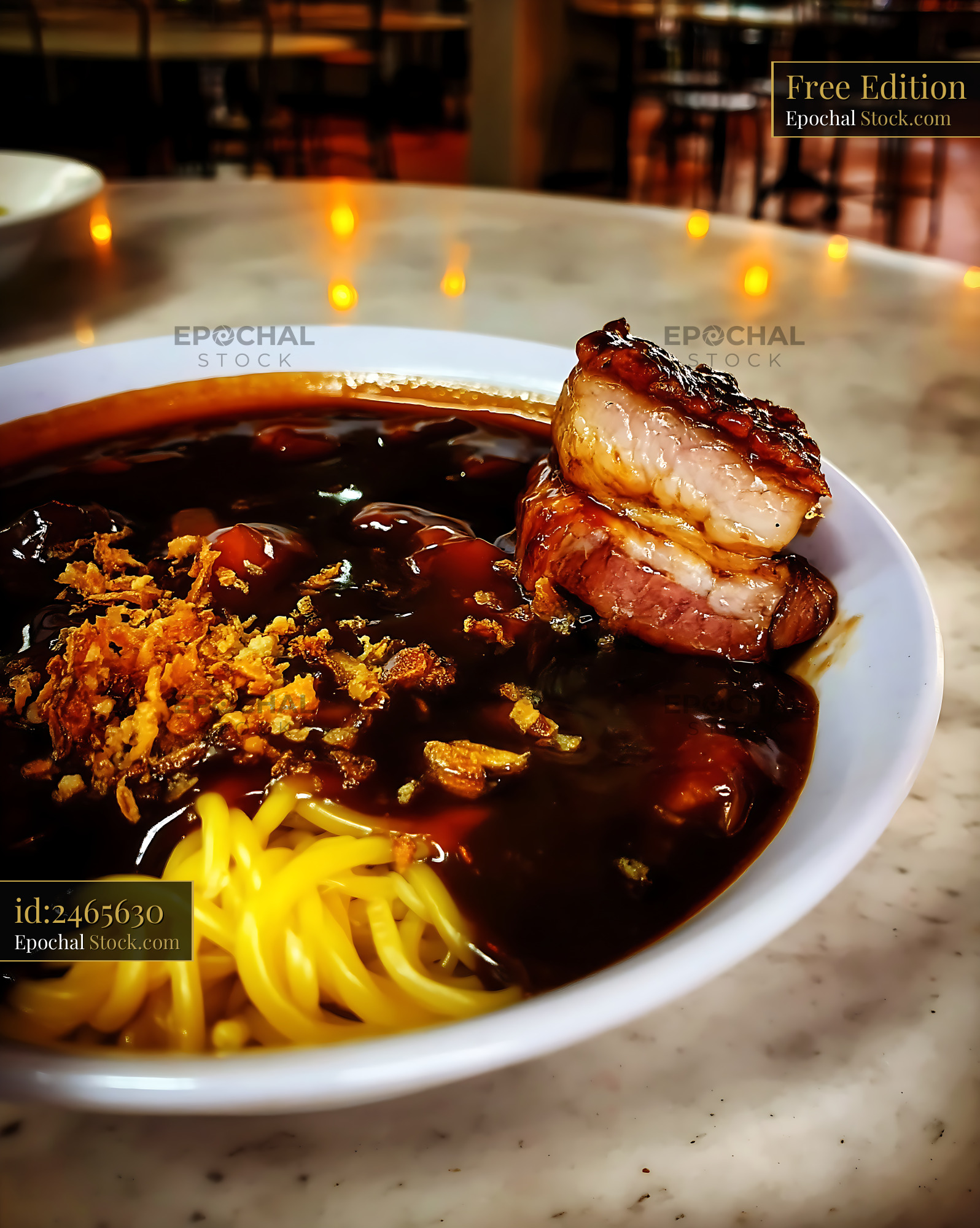 Rich Lor Mee Soup with Pork Belly and Crispy Shallots - stock photo