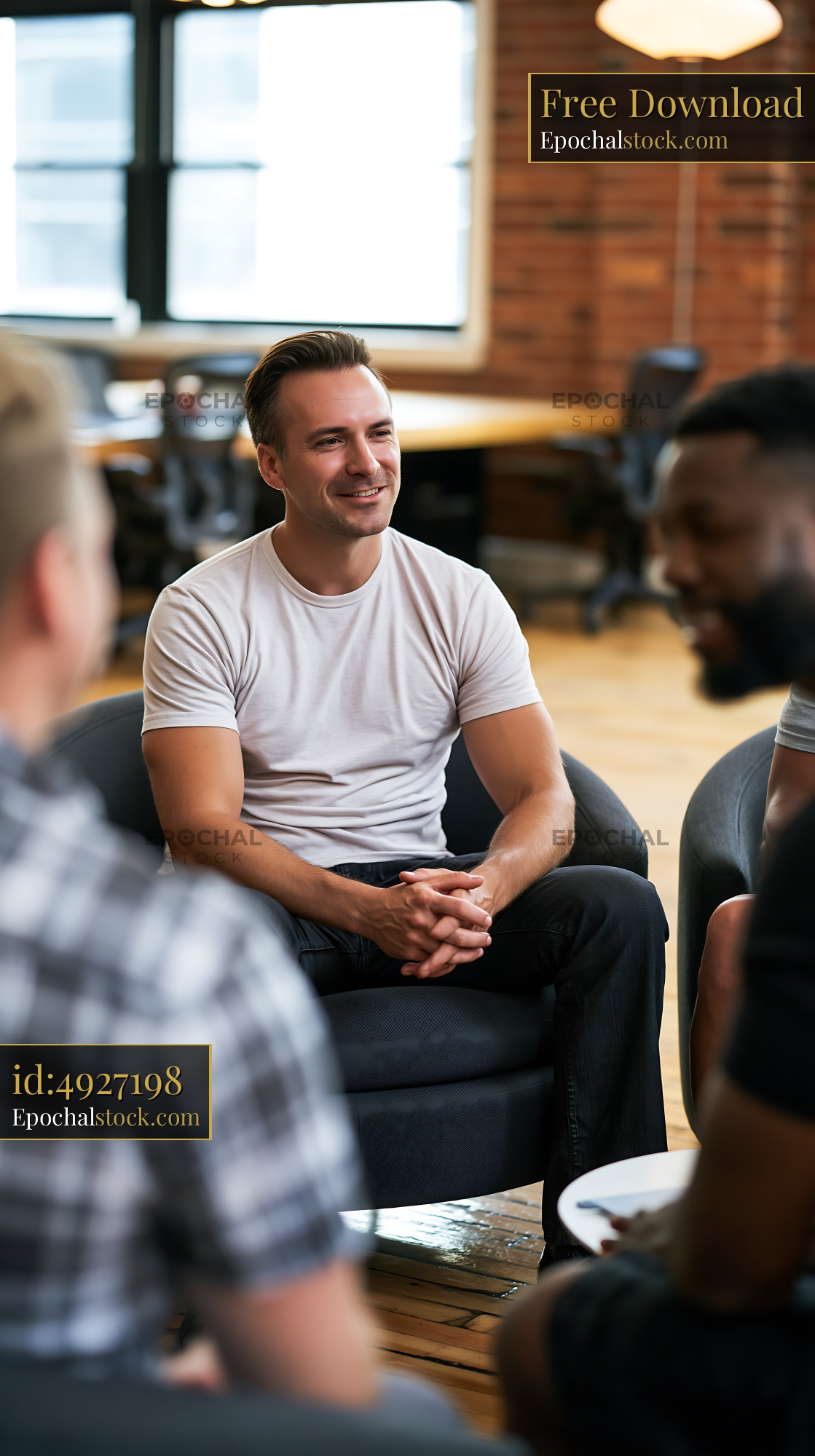 Watermarked full-resolution preview of Smiling man seated during a group conversation