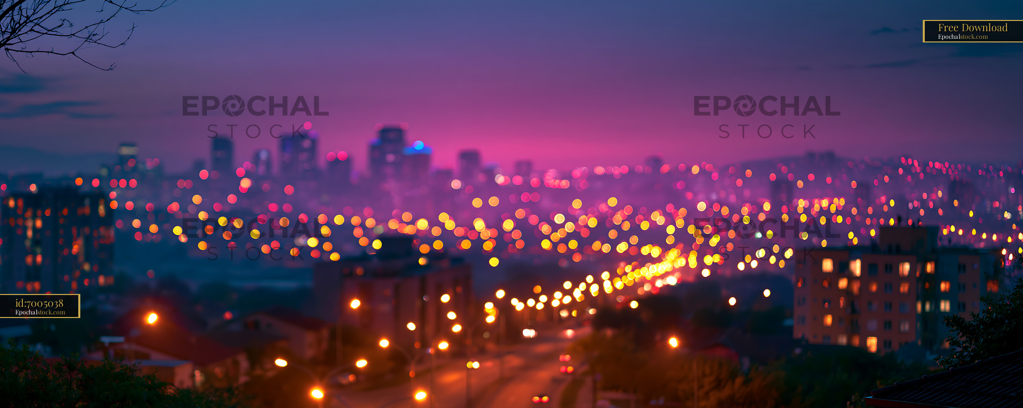 Watermarked full-resolution preview of City skyline at dusk with lights shining in the street