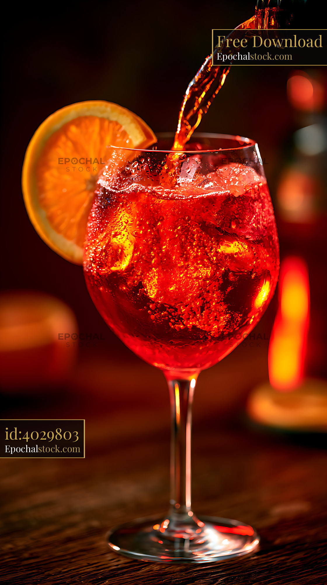 Watermarked full-resolution preview of Vibrant red cocktail with orange garnish and pouring drink
