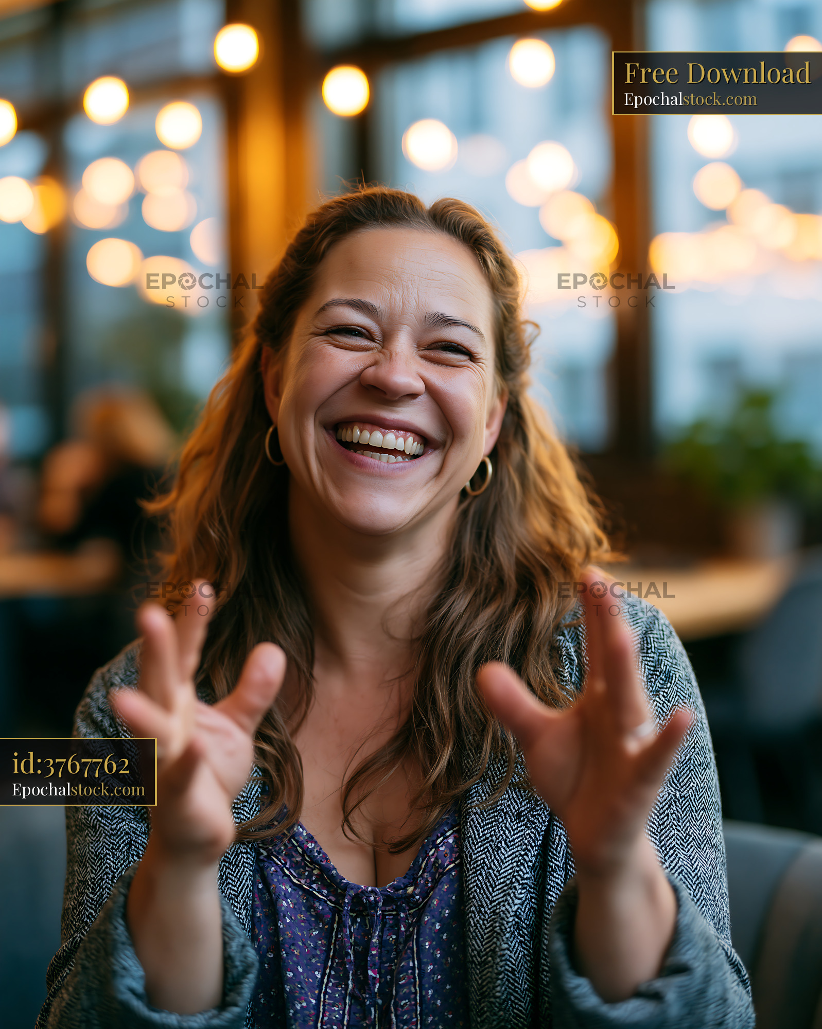 Watermarked full-resolution preview of Woman smiling while interacting with friends in a cozy cafe