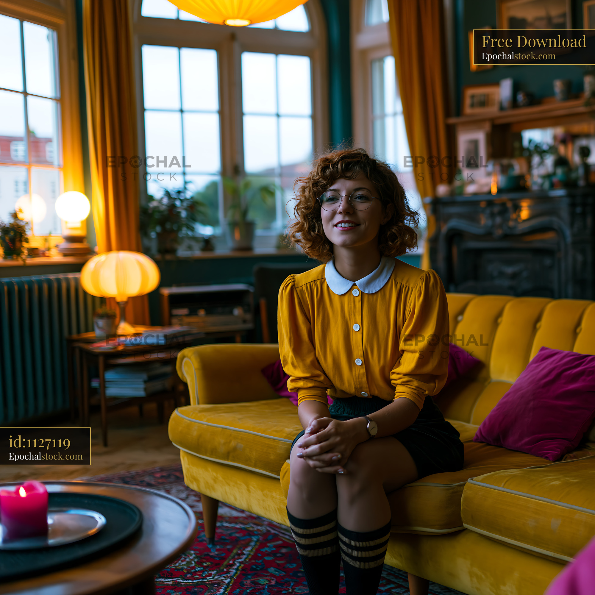 Watermarked full-resolution preview of Woman sitting on yellow sofa in a cozy room with warm lighting