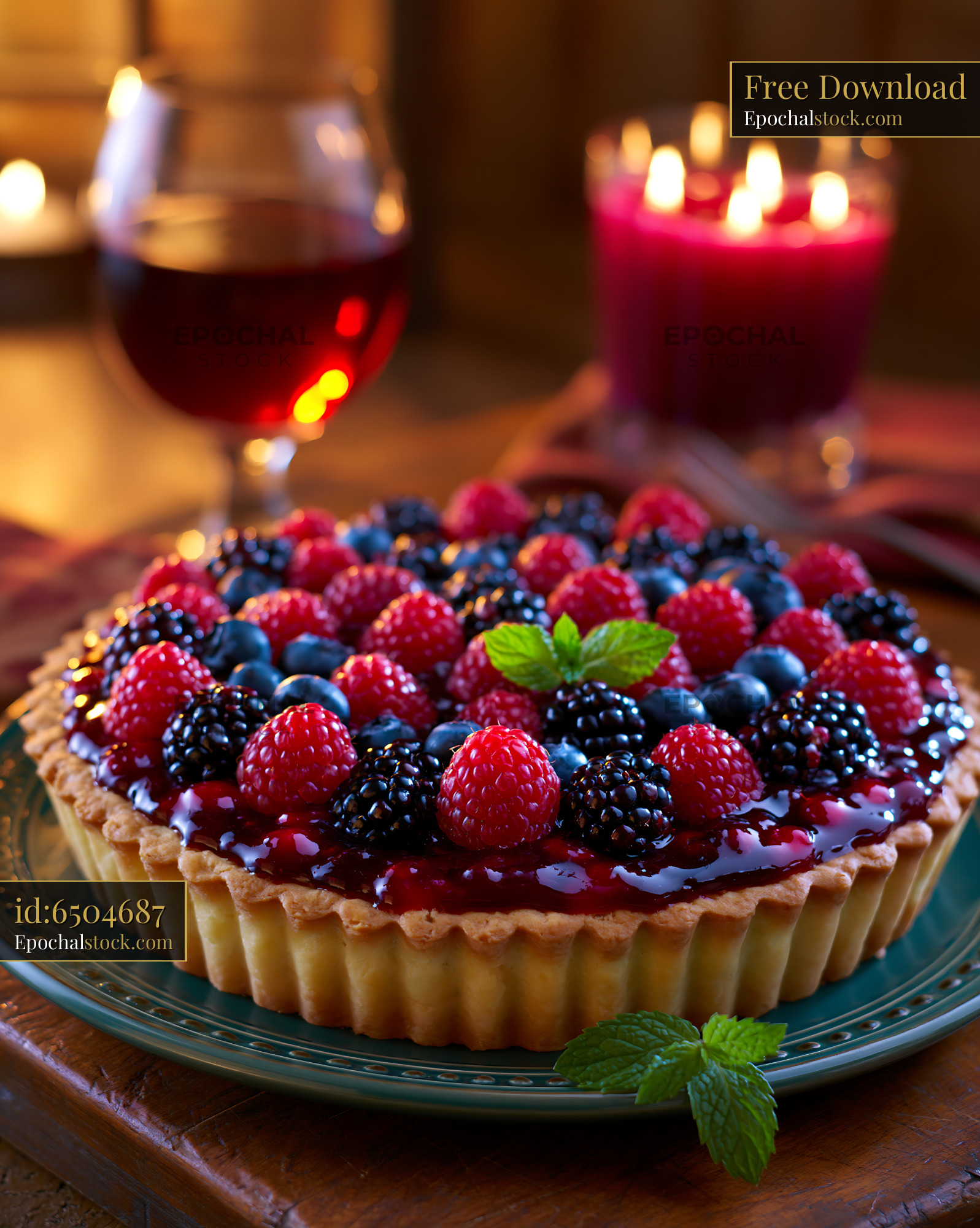 Watermarked full-resolution preview of Dessert with fresh berries on a table with wine and candles