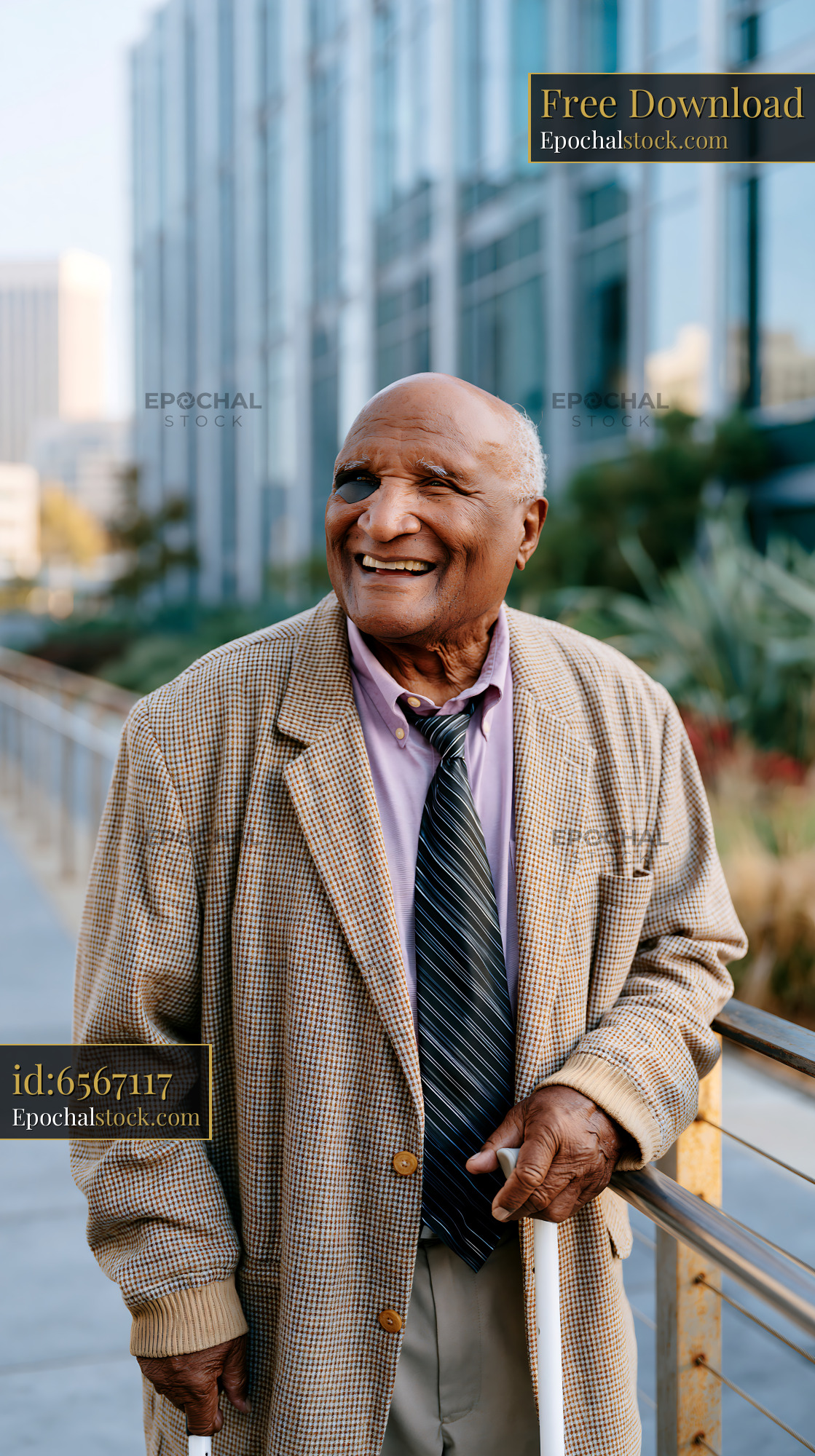 Watermarked full-resolution preview of Smiling elderly man standing outdoors in urban environment
