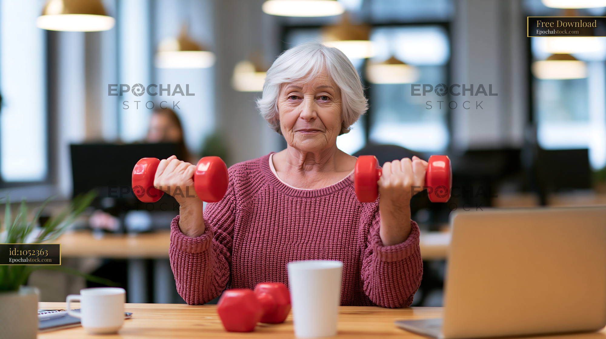 Watermarked full-resolution preview of Senior woman with dumbbells in a modern office