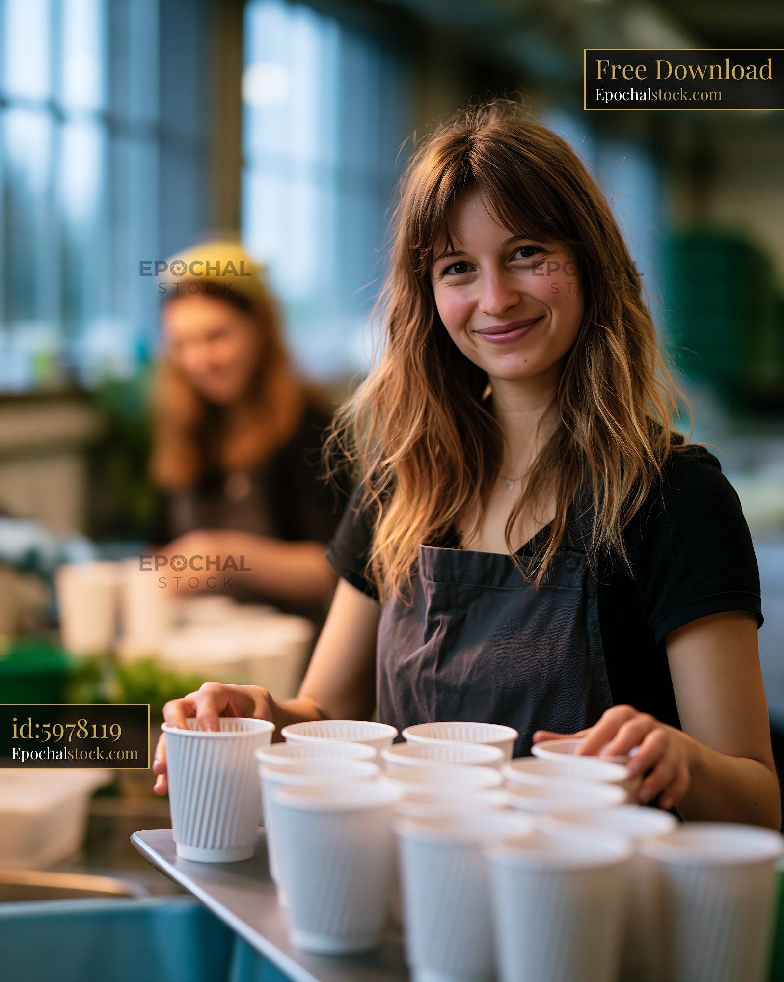 Watermarked full-resolution preview of Woman serving drinks in a cafe during the day