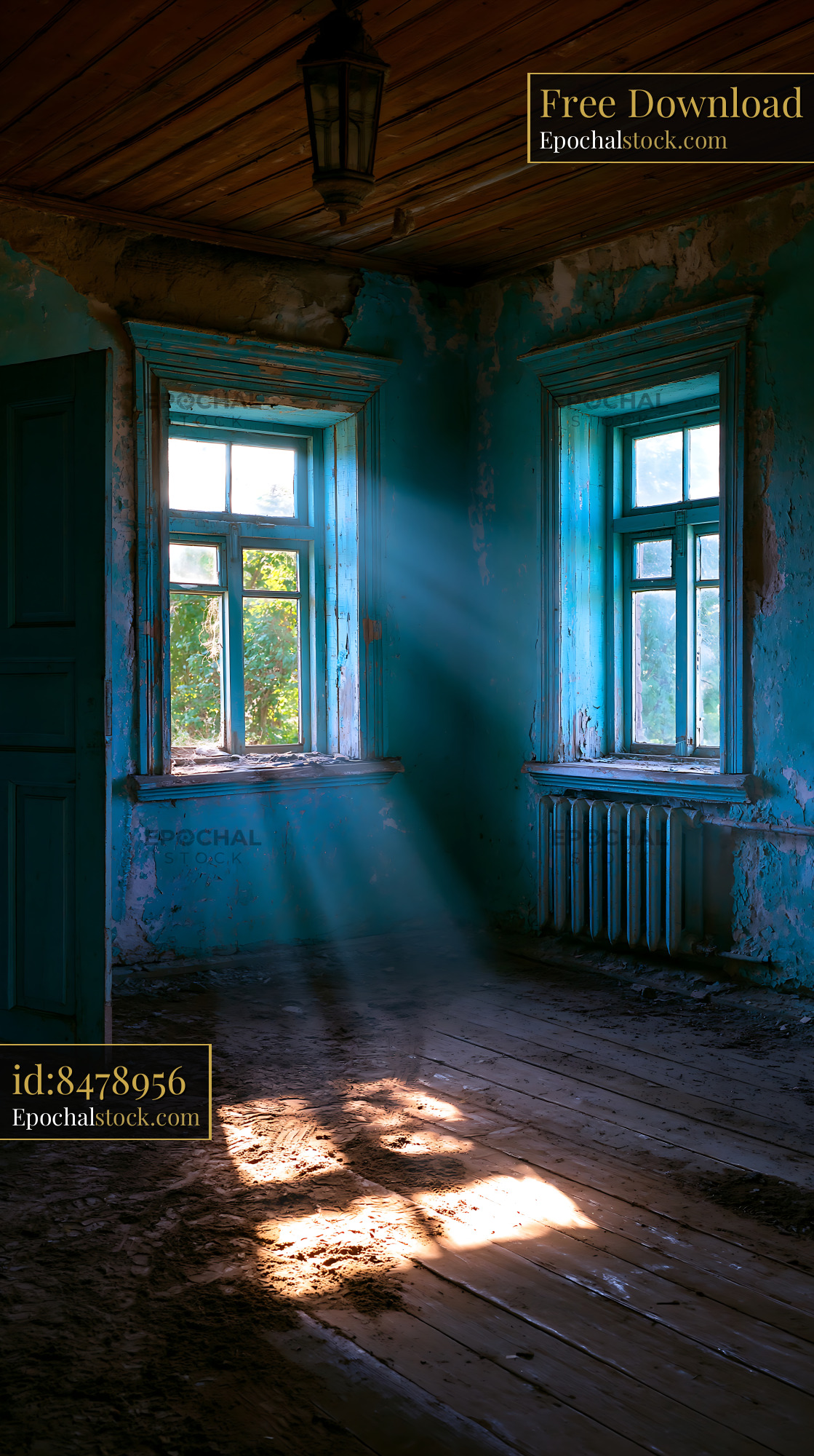 Watermarked full-resolution preview of Light shines through windows in an old, abandoned room