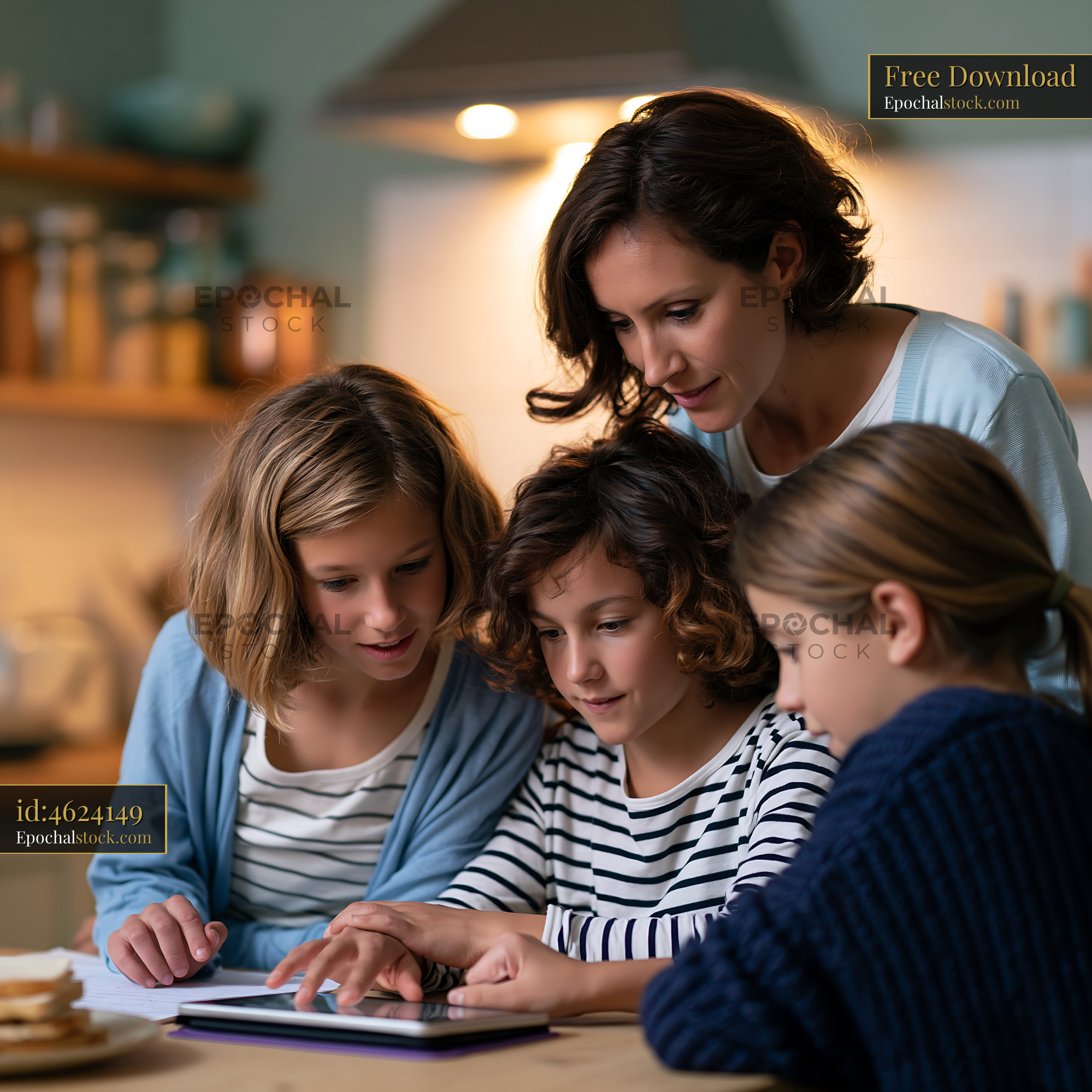 Watermarked full-resolution preview of Family enjoying tablet time together in cozy kitchen