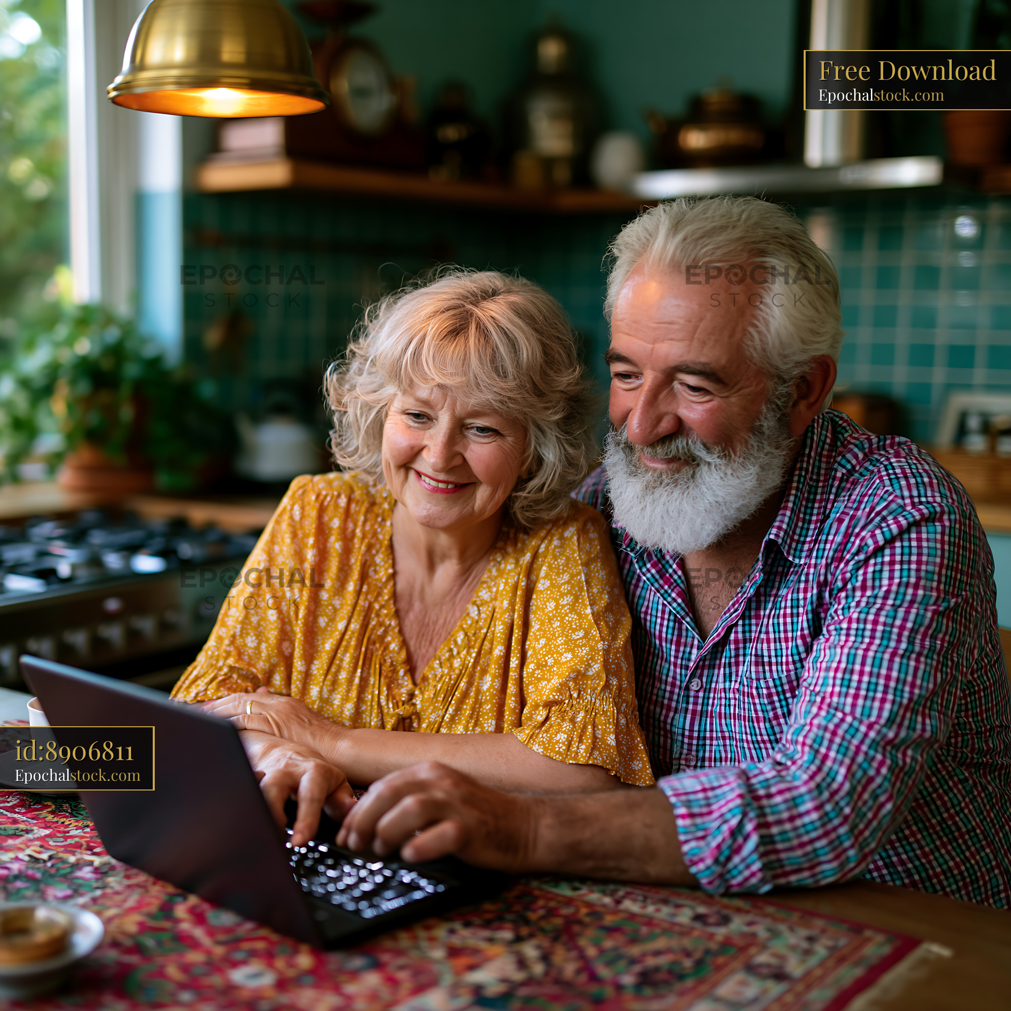 Watermarked full-resolution preview of Elderly couple using a laptop together in a cozy kitchen