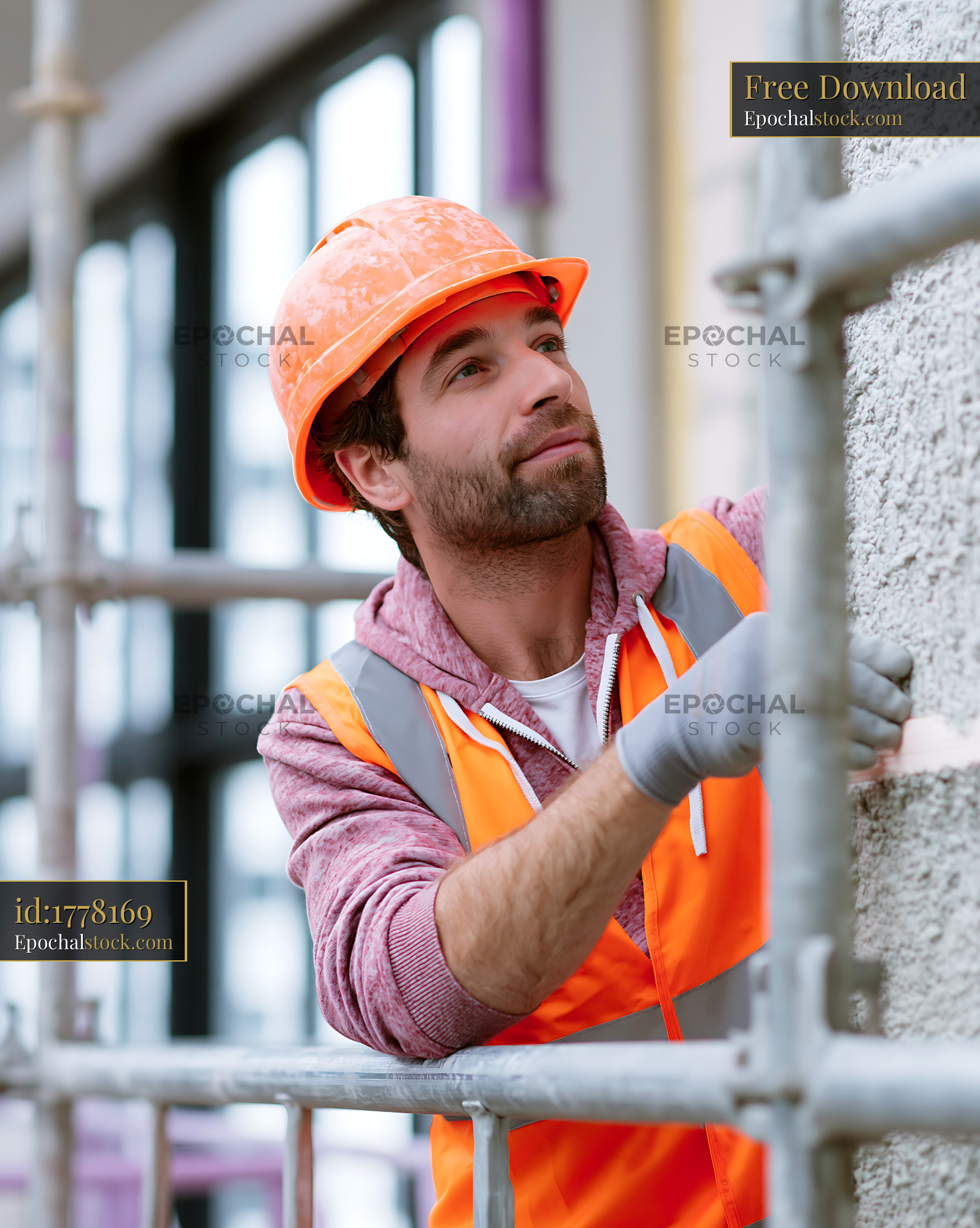 Watermarked full-resolution preview of Construction worker inspecting wall at building site