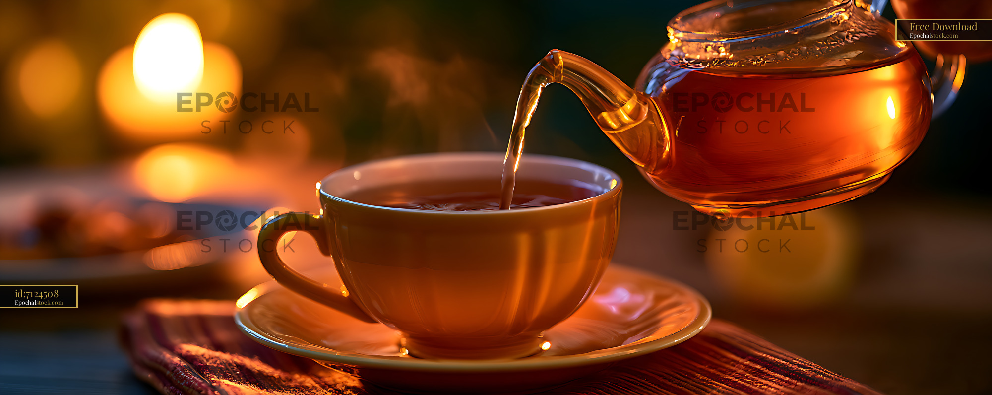 Watermarked full-resolution preview of Amber tea poured from a glass teapot into a cup