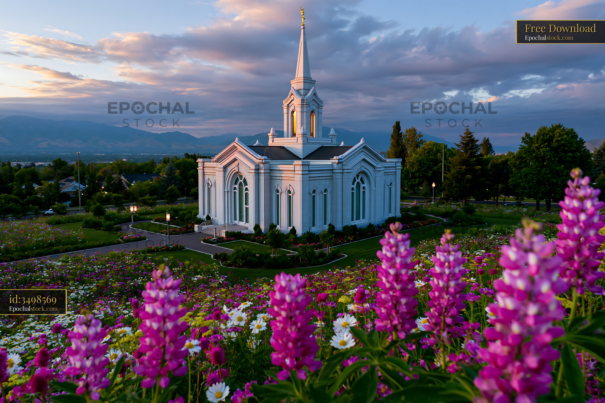 Watermarked full-resolution preview of Sunset over a white church surrounded by colorful flowers