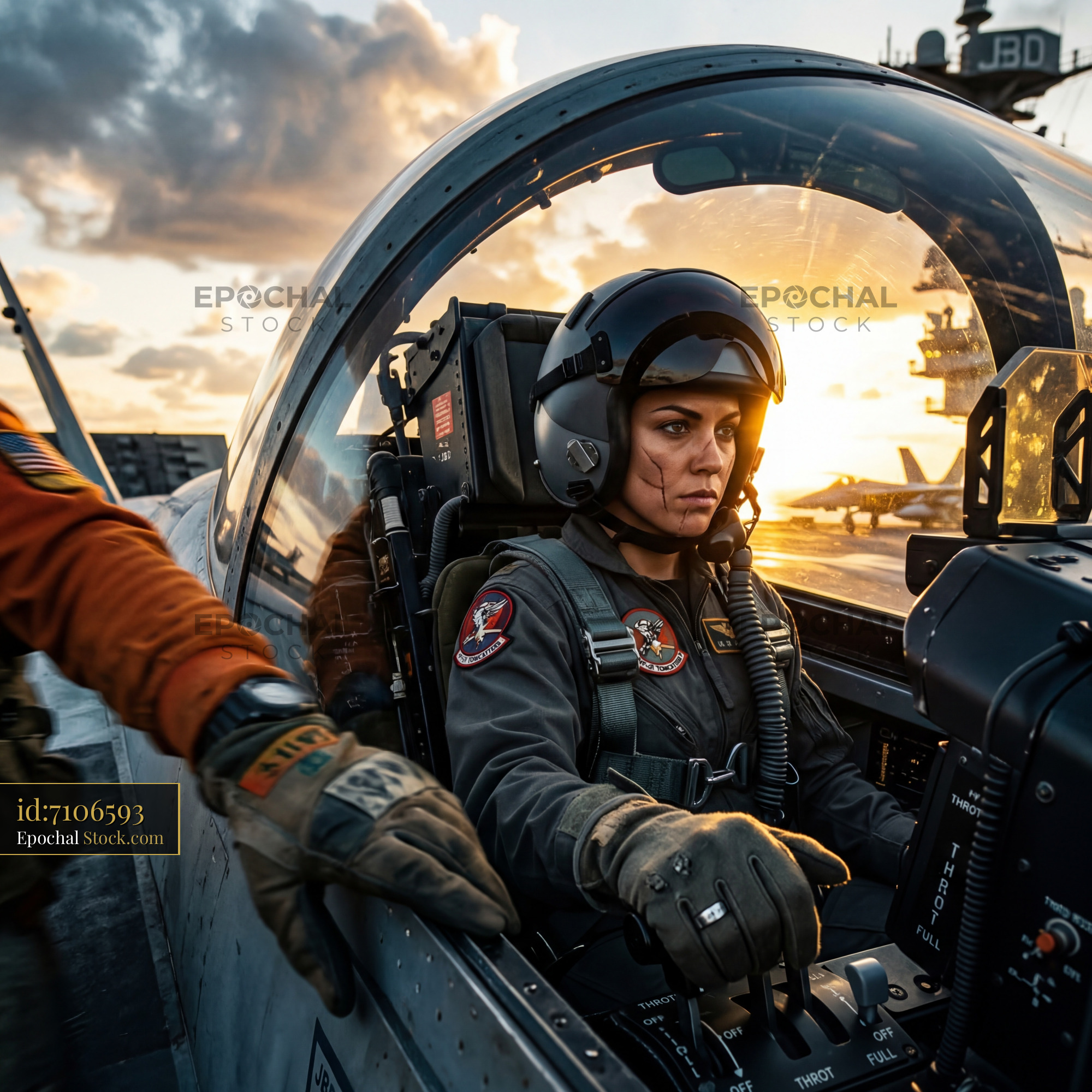 Pilot prepares for flight on aircraft carrier at sunset Premium Stock Image