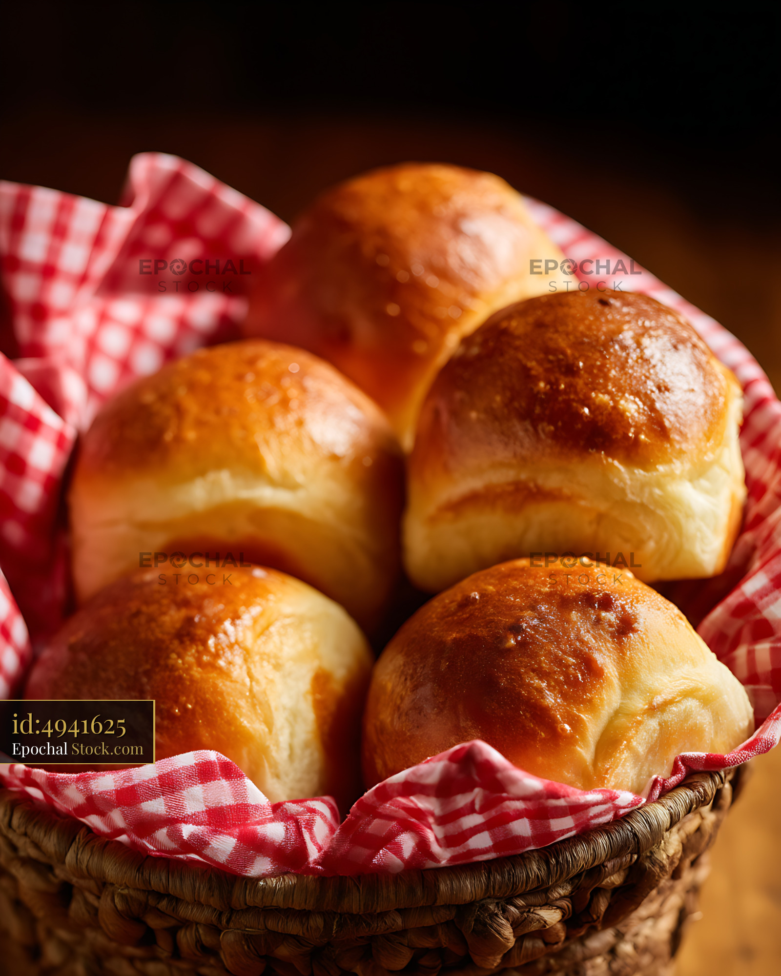 Fresh Baked Bierocks in Rustic Basket with Warm Golden Crust and Traditional Cloth - stock photo