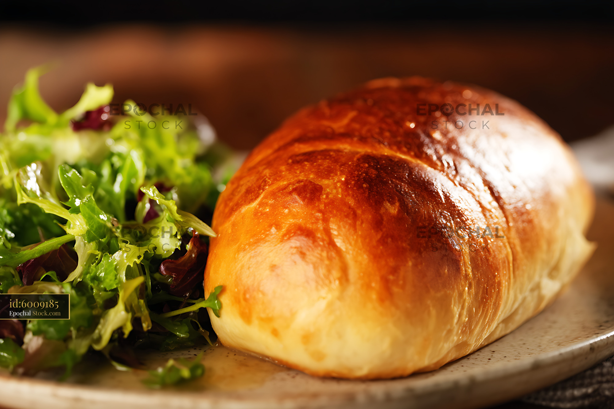 Bierocks Pastry Served with Fresh Mixed Greens Salad on Plate - stock photo