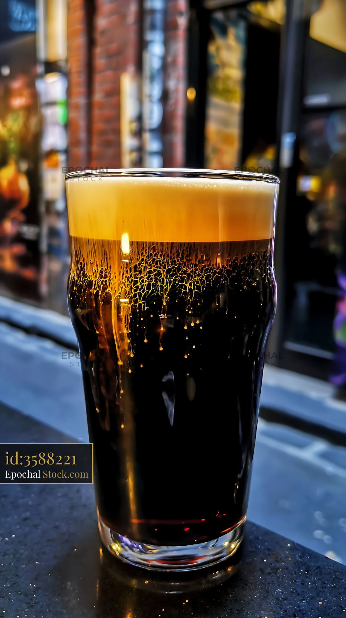 Nitro Caramel Coffee Cascading in Glass - stock photo